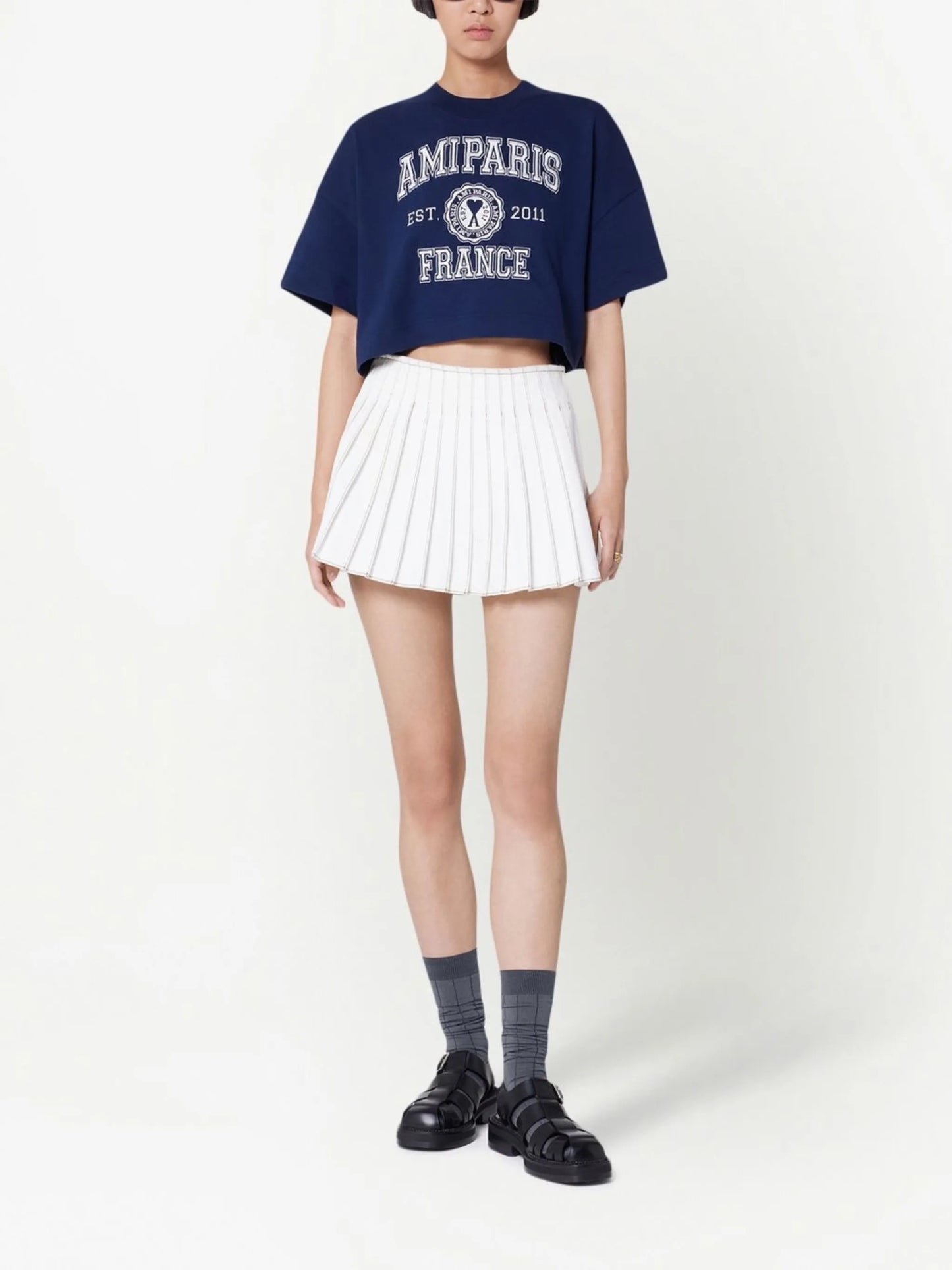 high-waisted pleated mini skirt