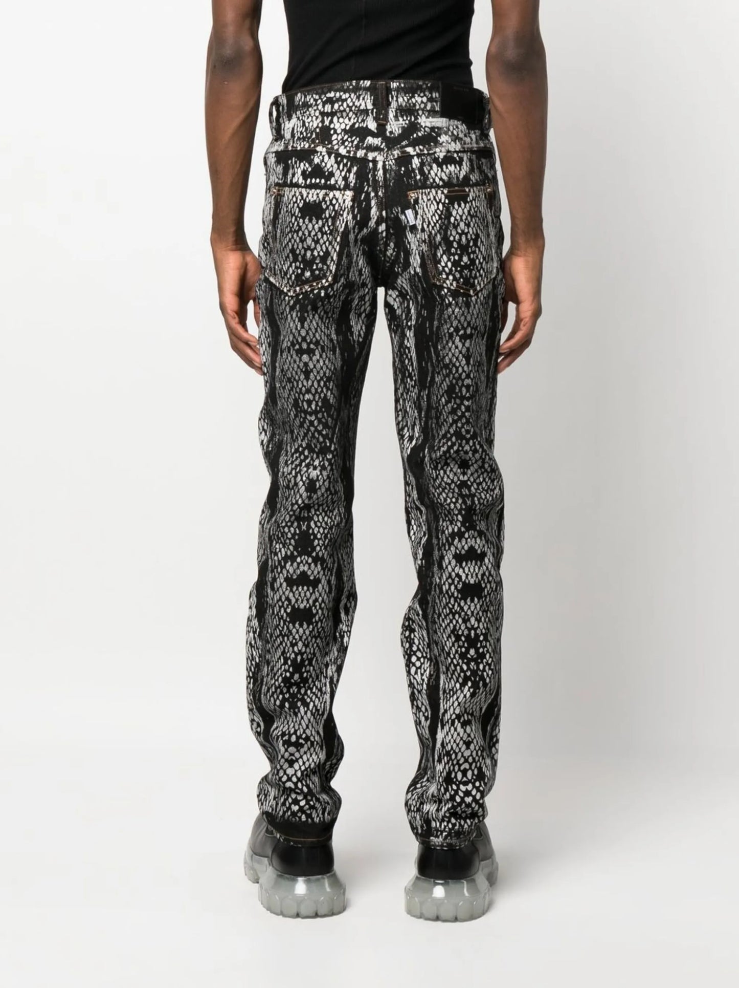 snakeskin-print denim trousers