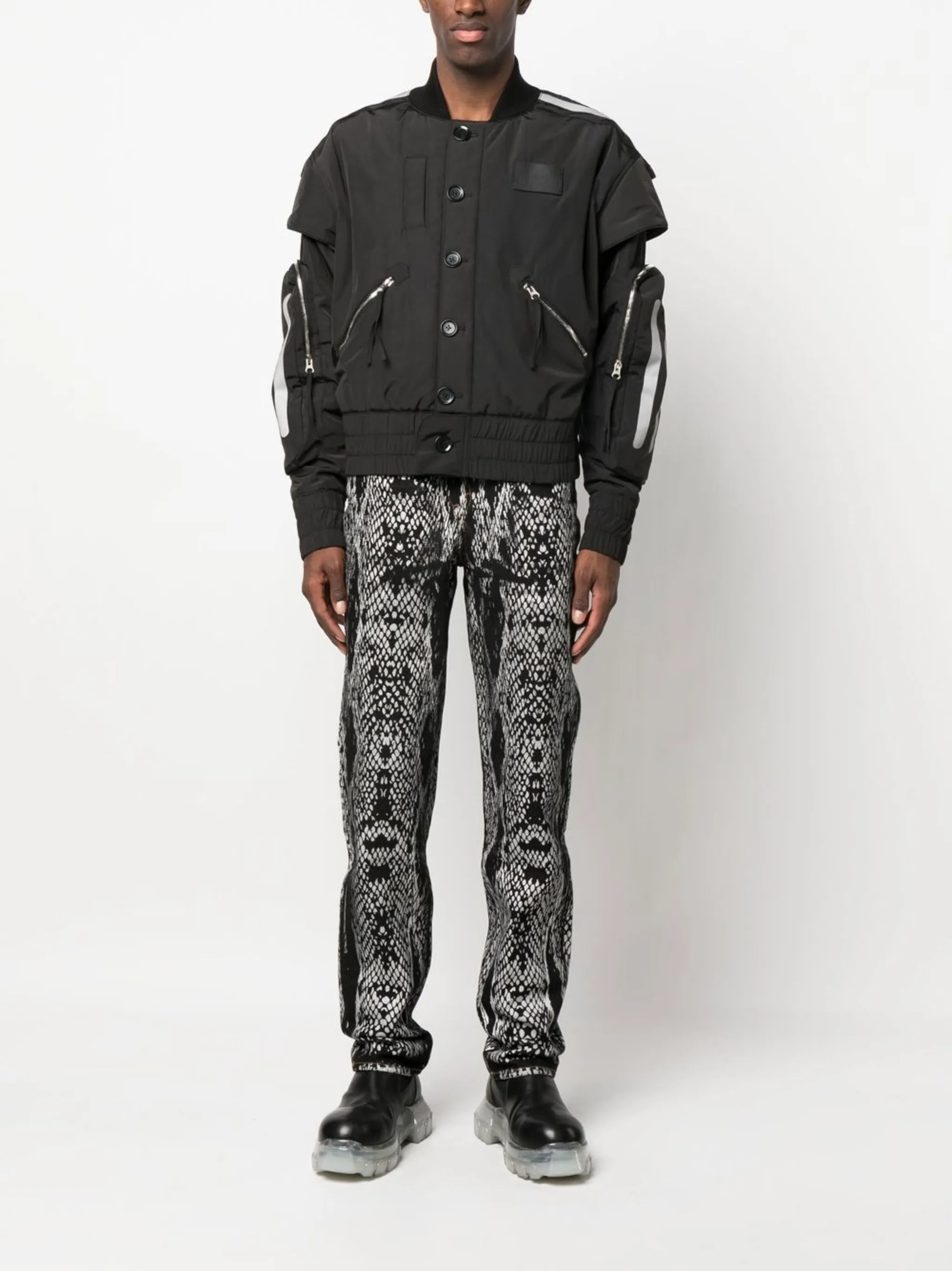 snakeskin-print denim trousers