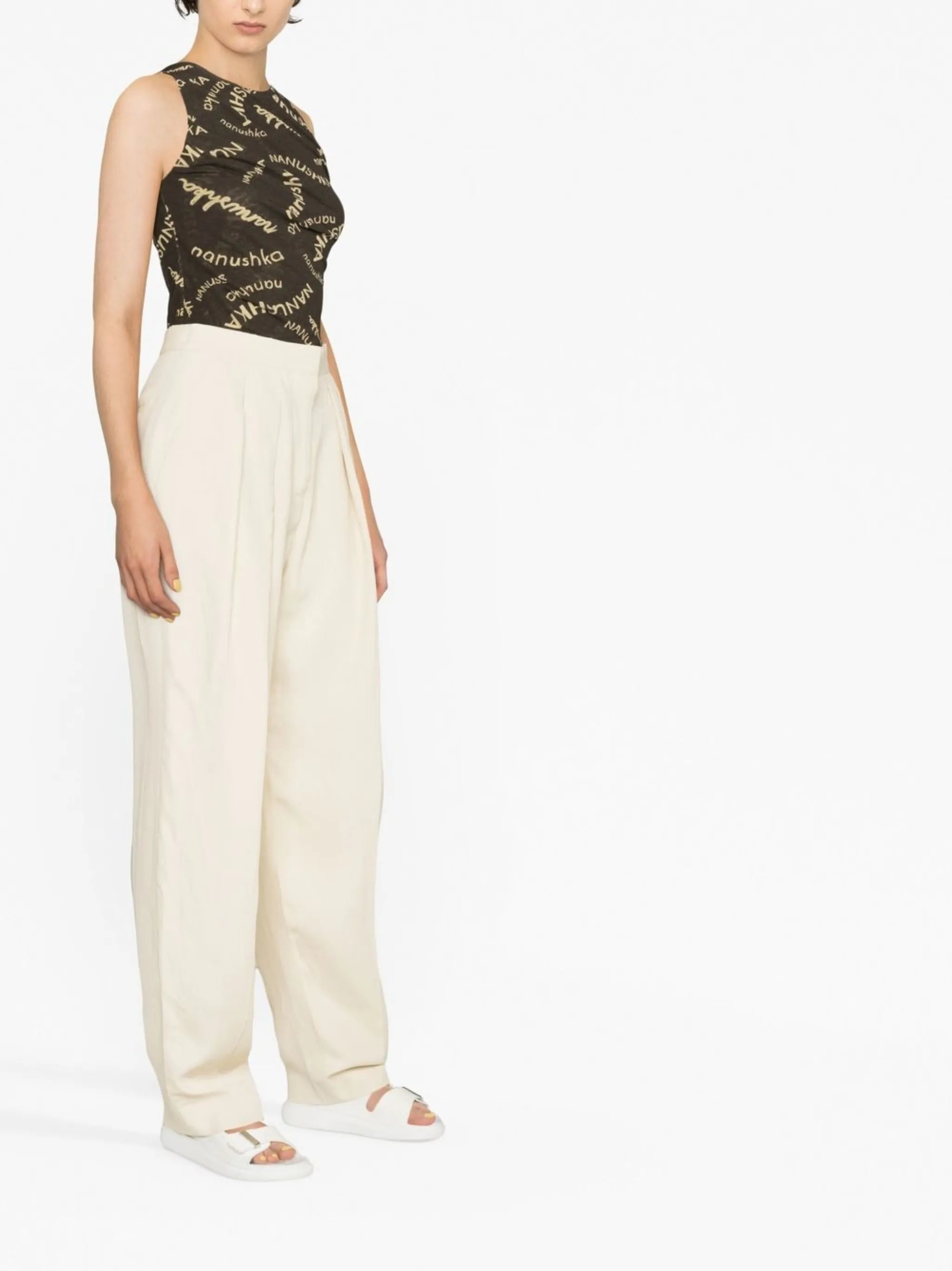 high-waisted pleated trousers