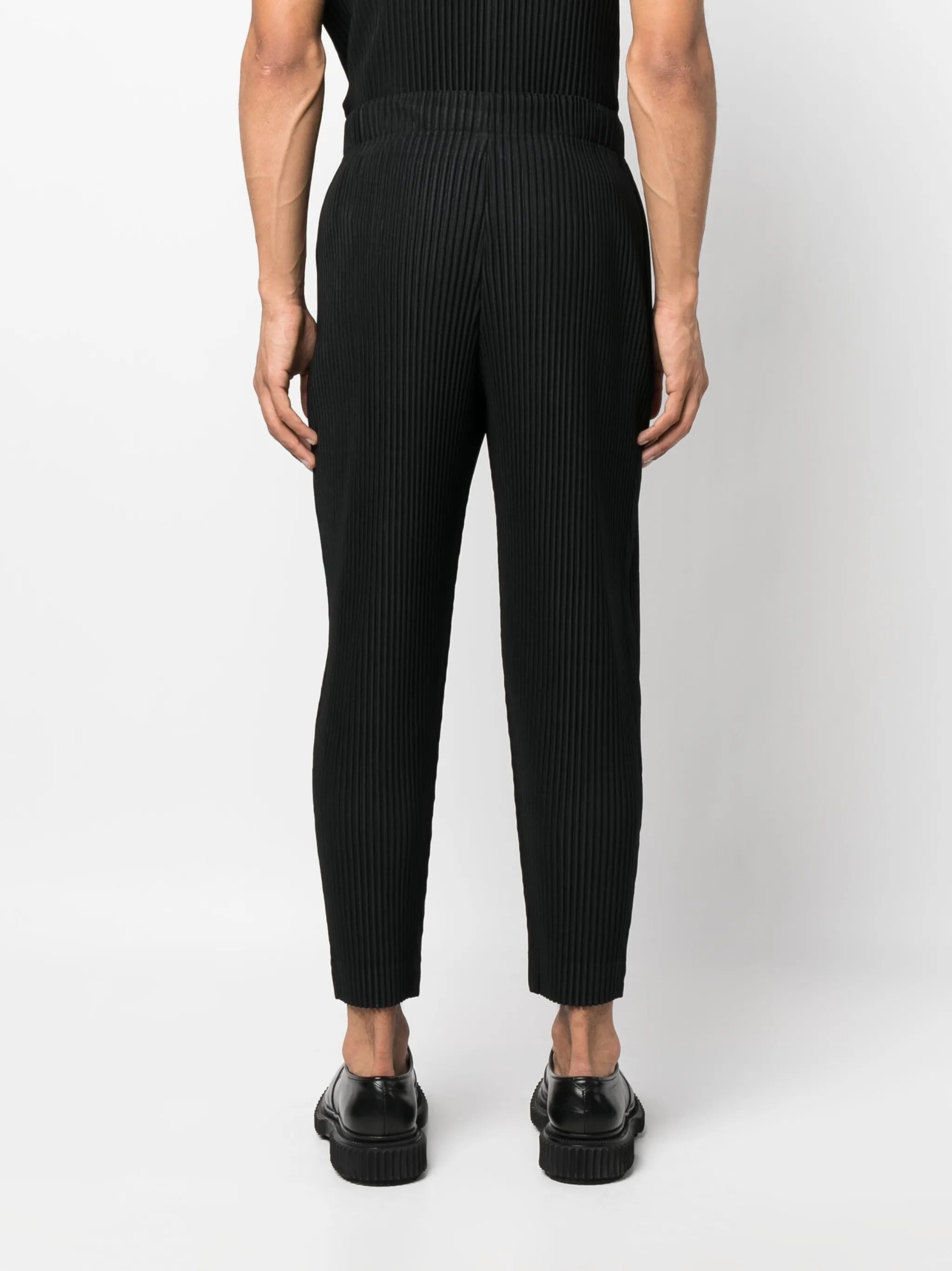 fully-pleated tapered-leg trousers