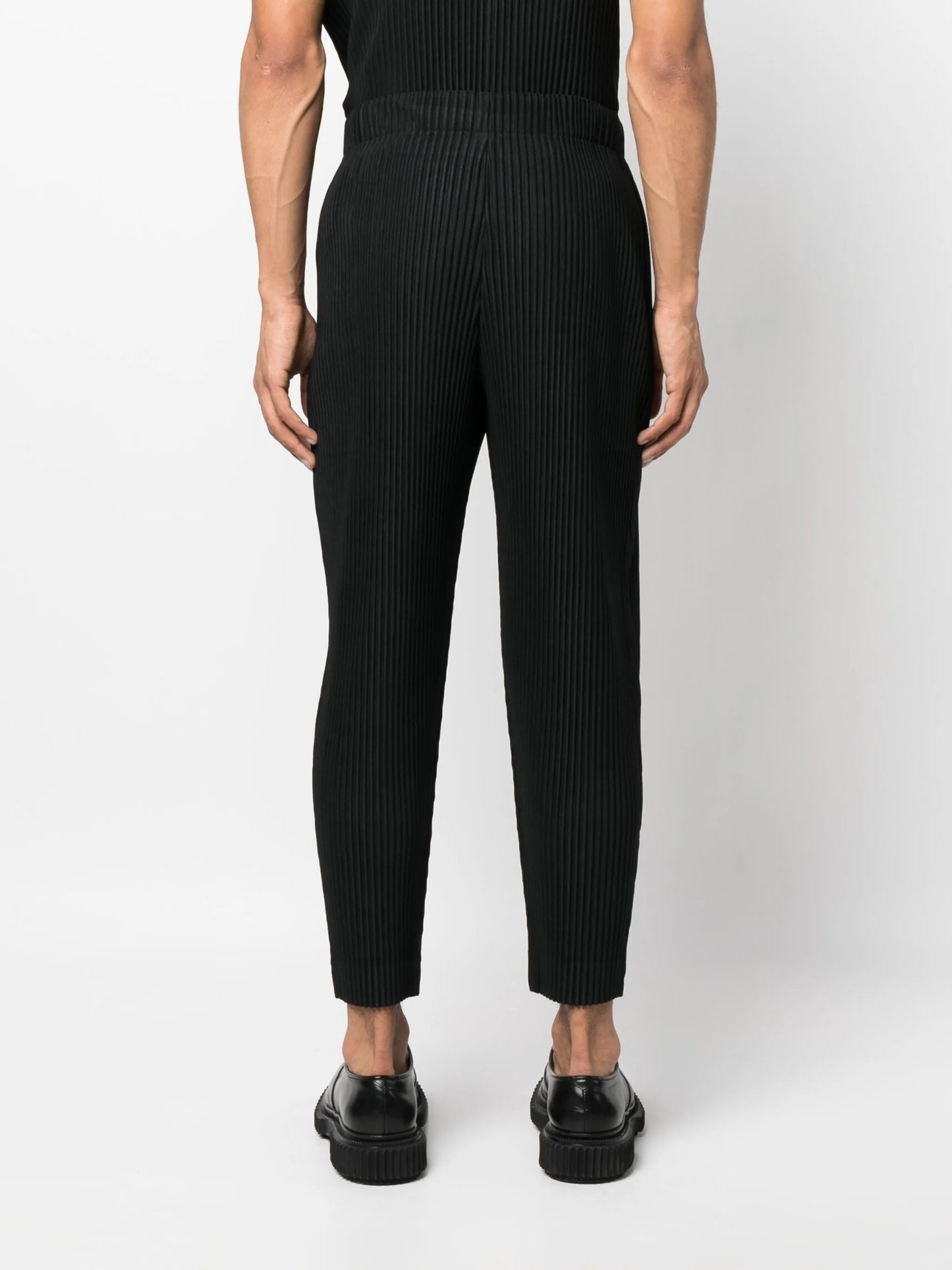 fully-pleated tapered-leg trousers