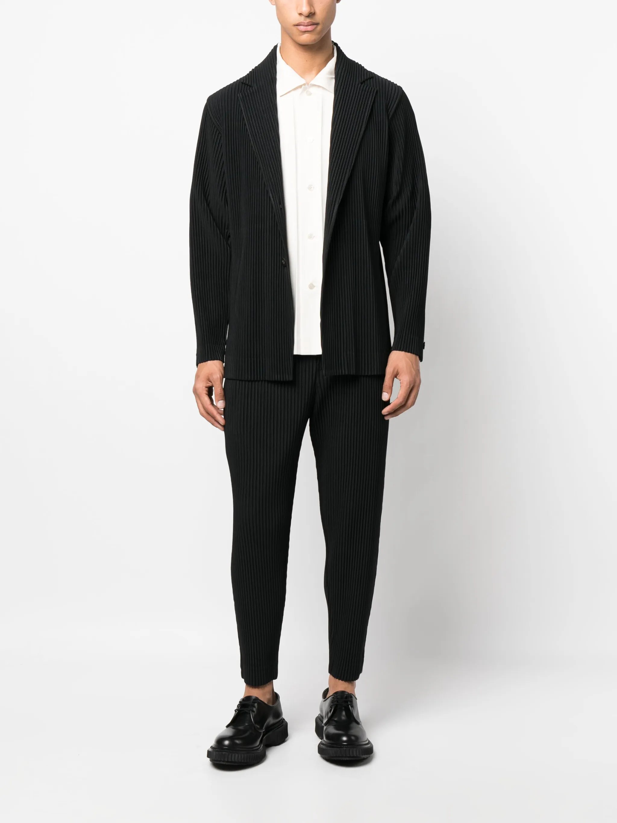 fully-pleated tapered-leg trousers