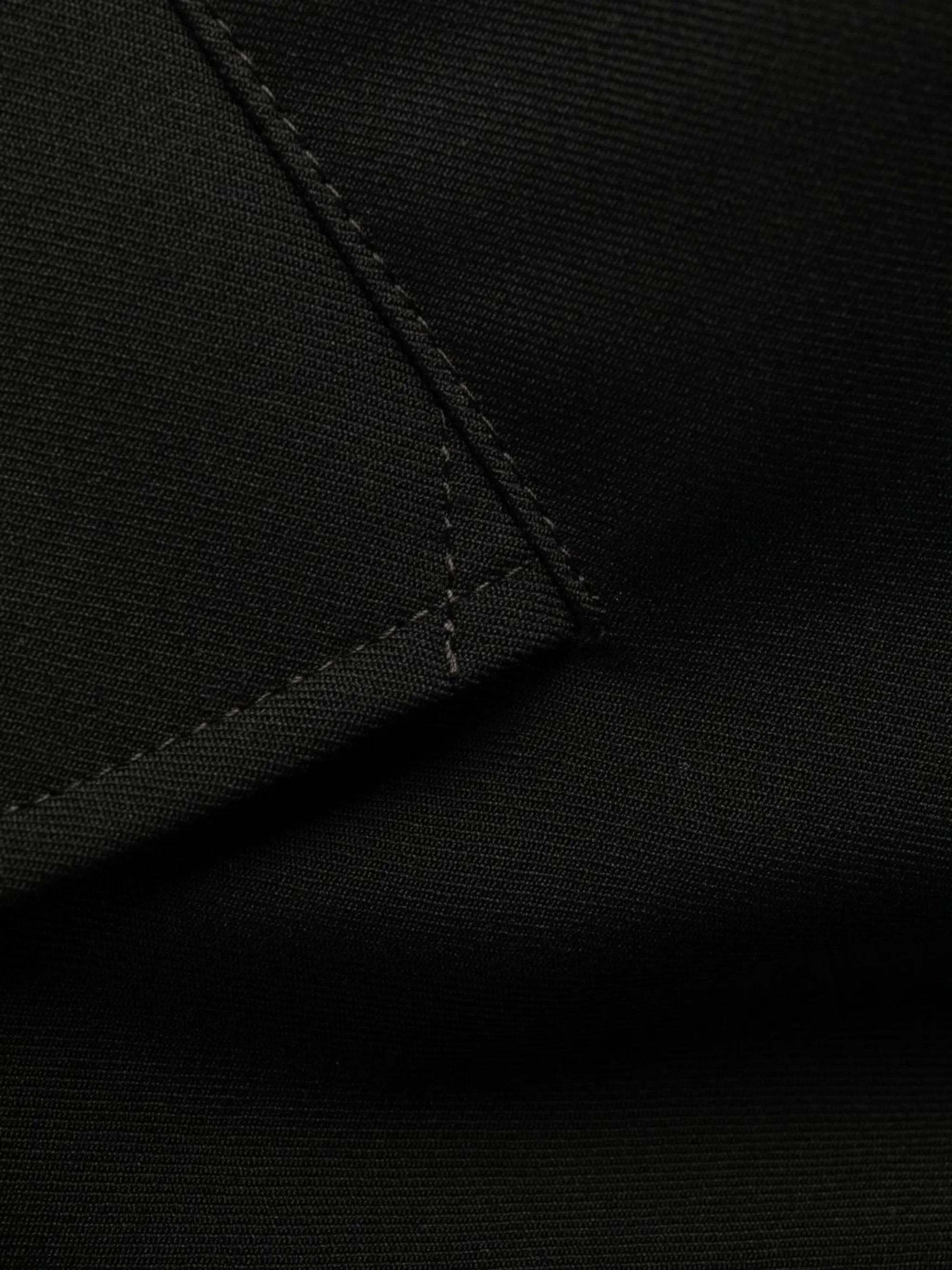 eyelet-embellished rain coat