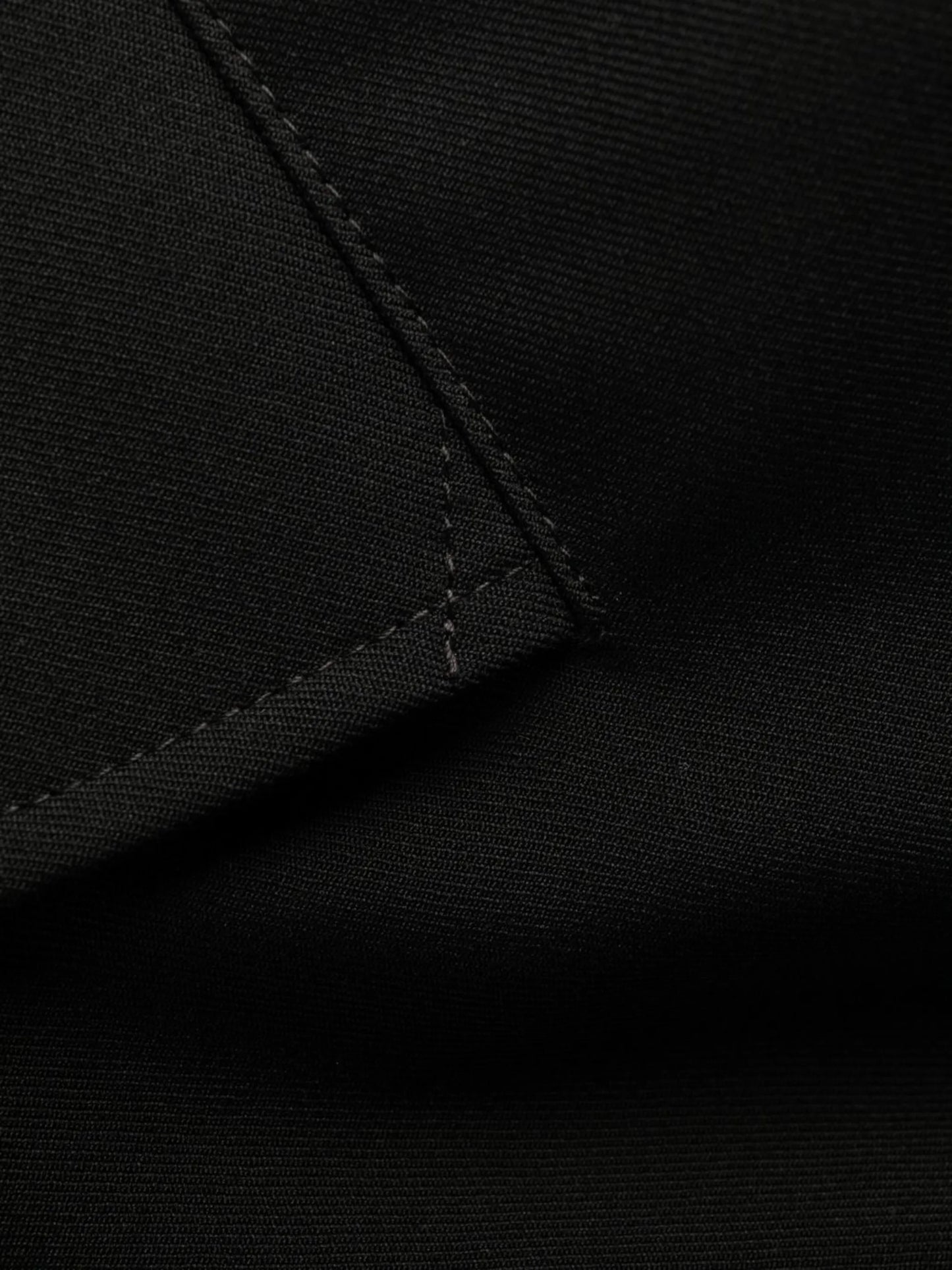 eyelet-embellished rain coat