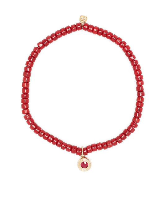 14kt yellow gold and ruby fluted beaded bracelet