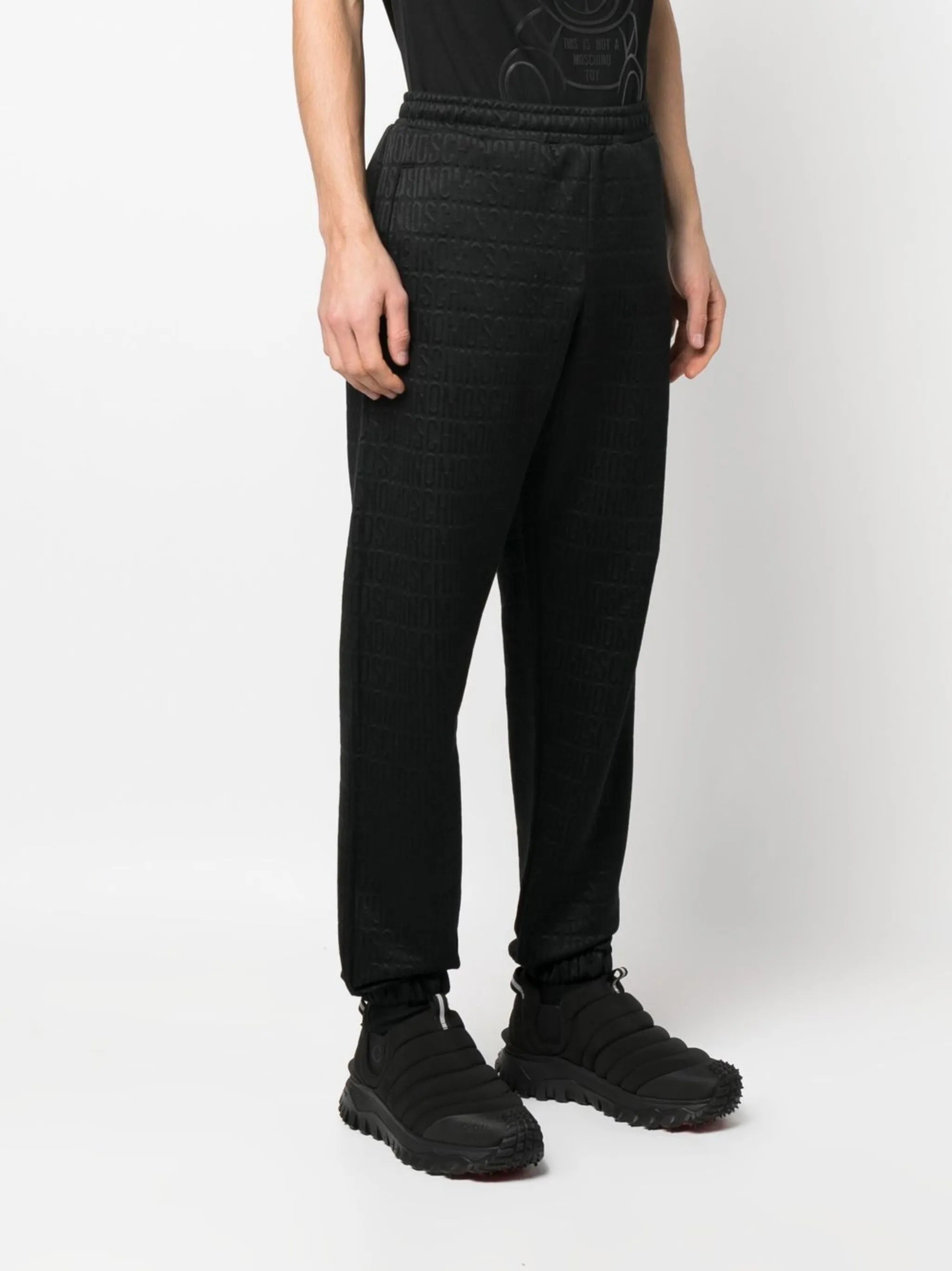 all-over logo-print track pants