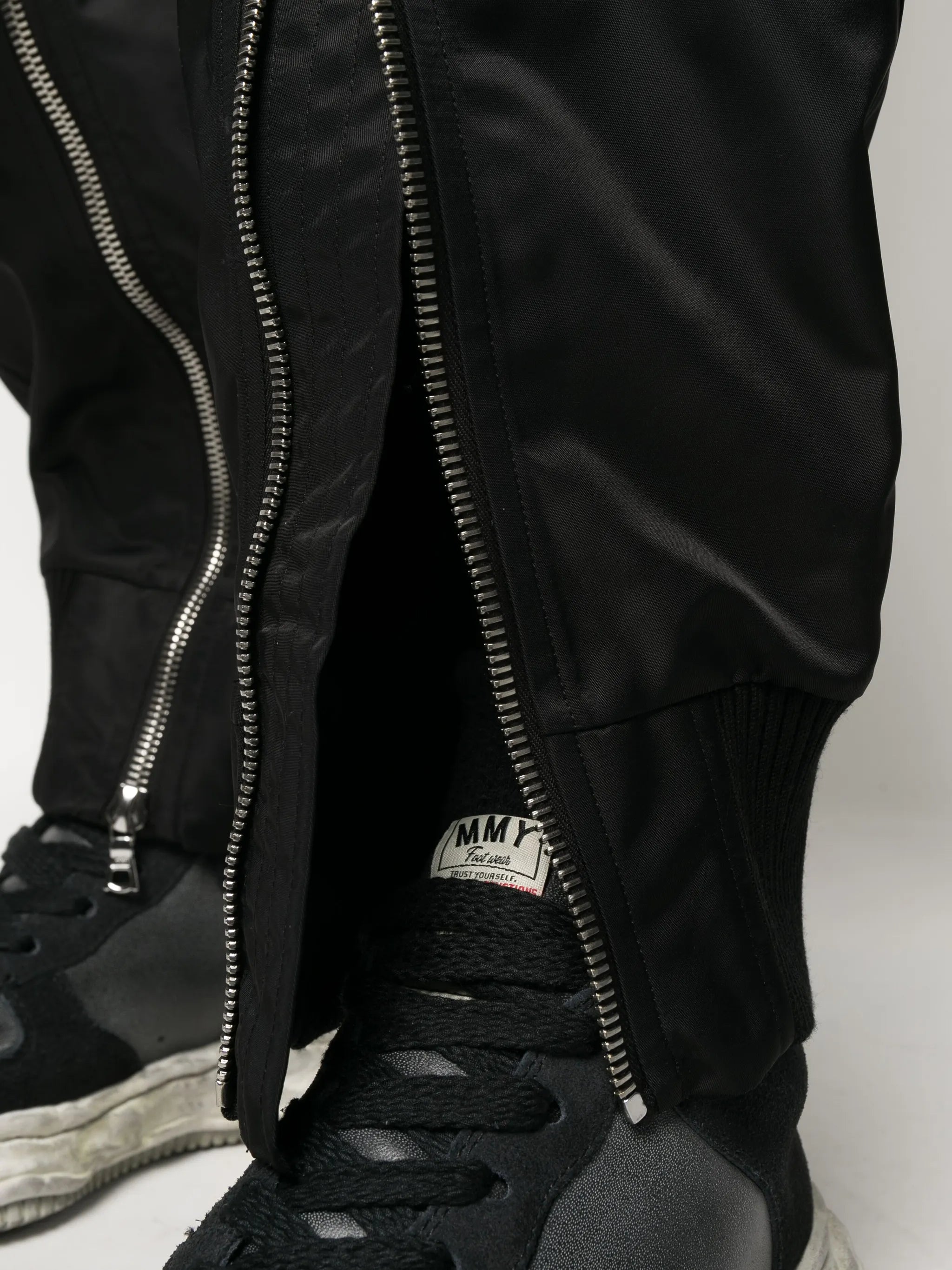 zip-detailing satin trousers
