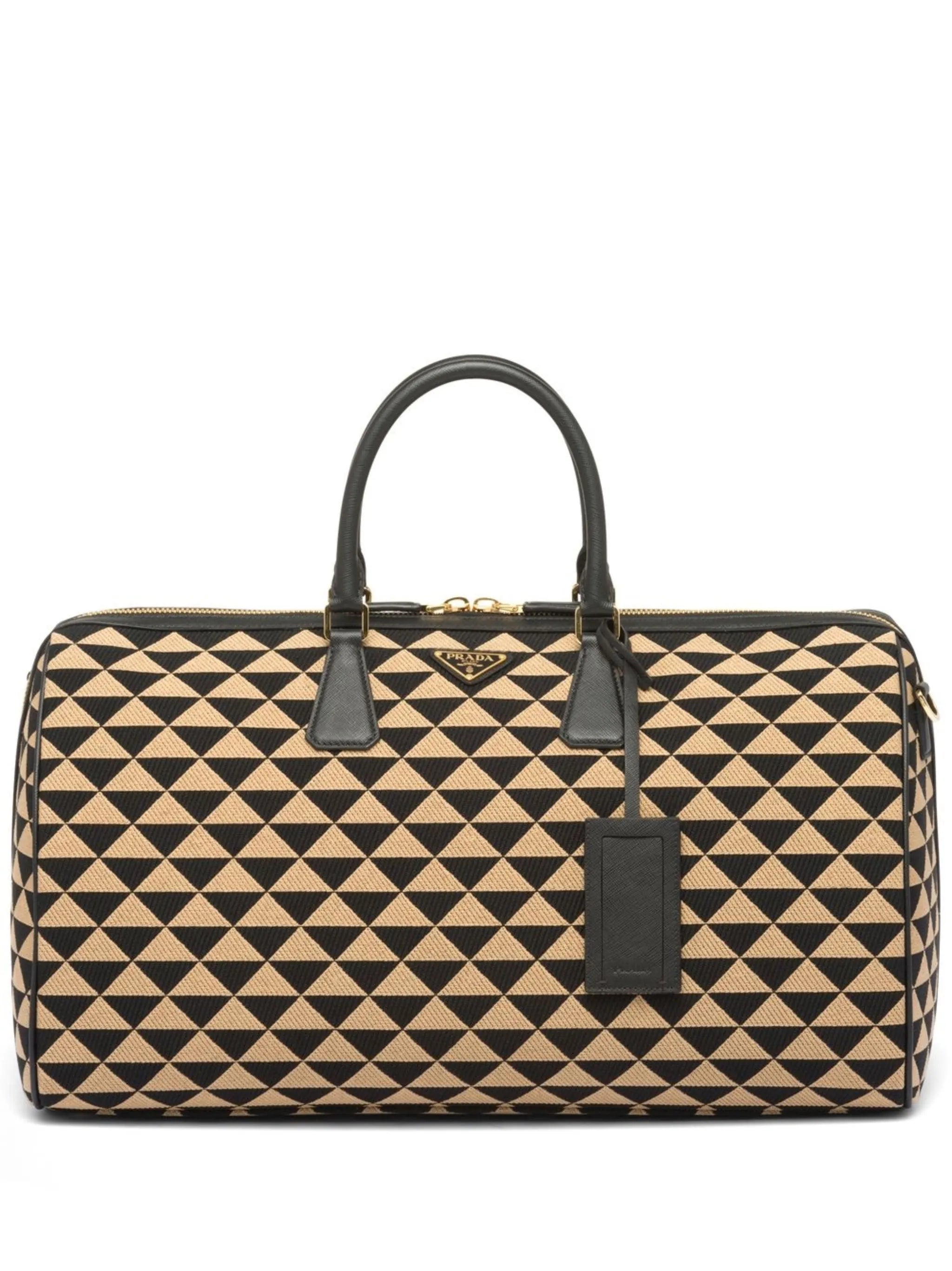 Symbole embroidered fabric travel bag