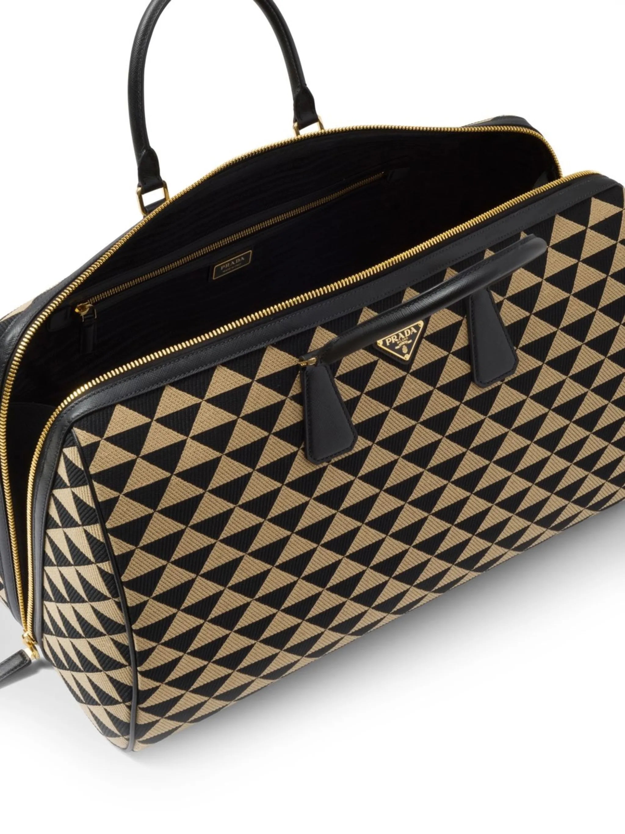 Symbole embroidered fabric travel bag