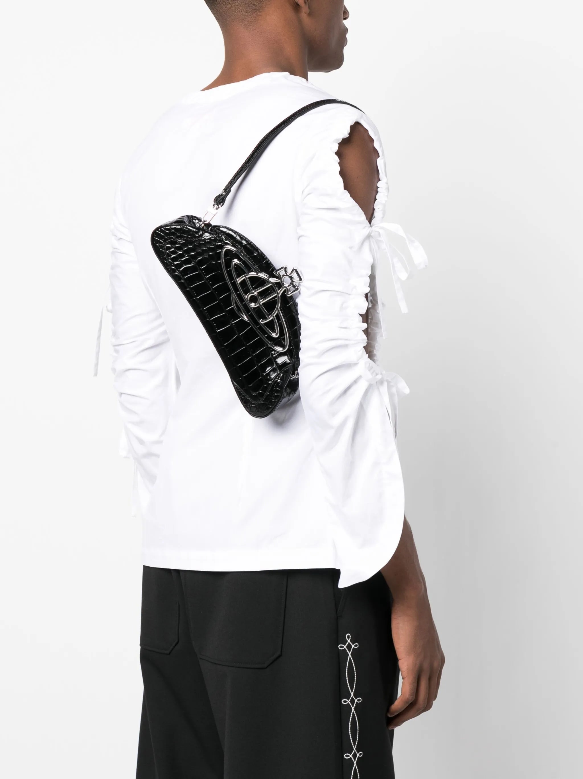 Amber crocodile-embossed clutch bag