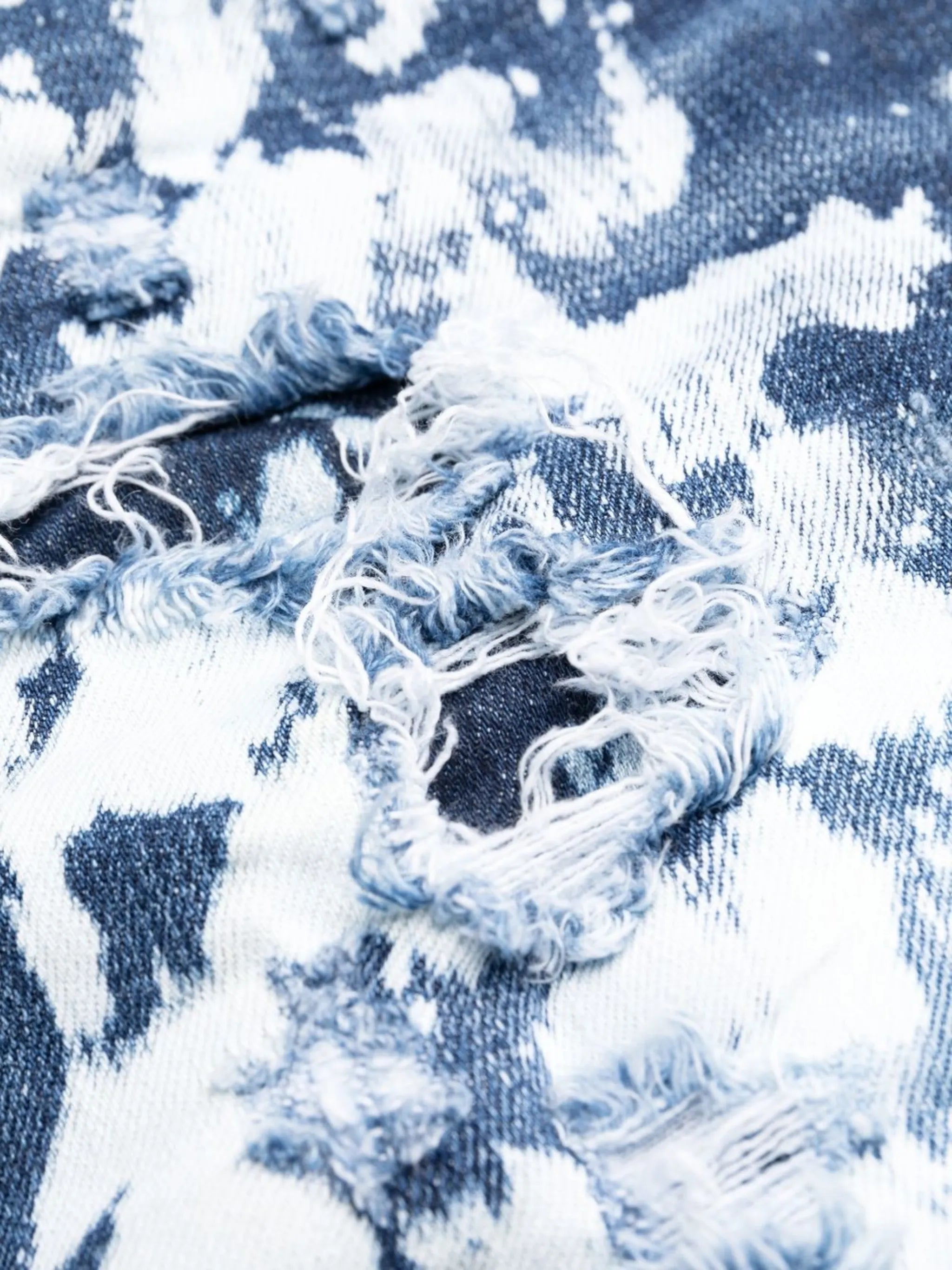 paint splattered distressed jeans