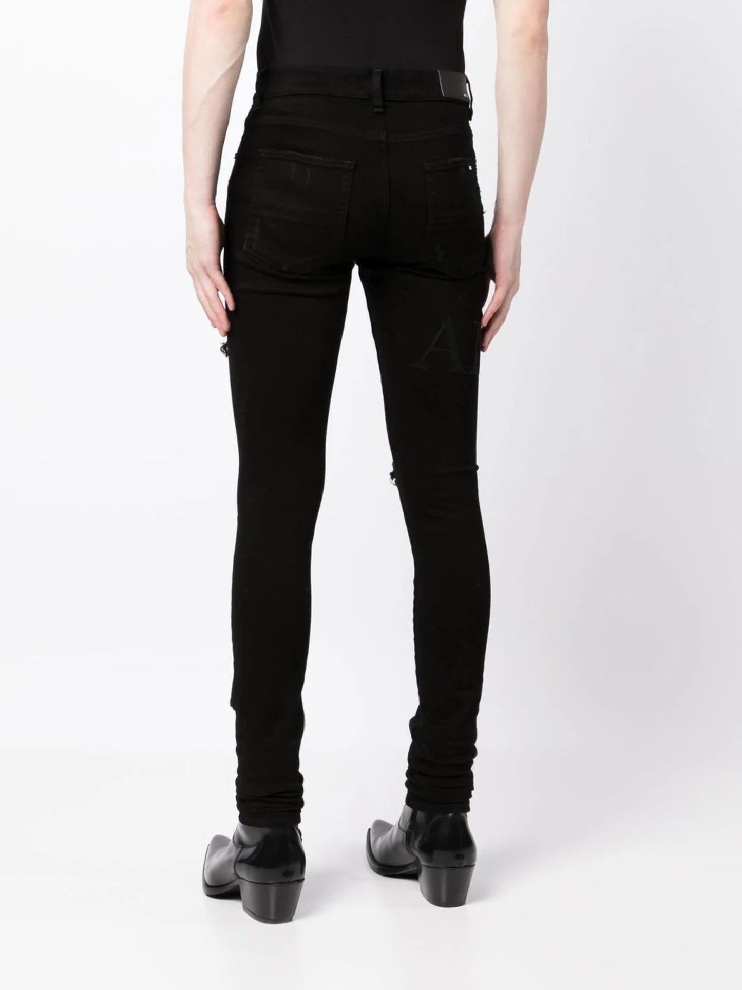 ripped-knee logo-print skinny jeans