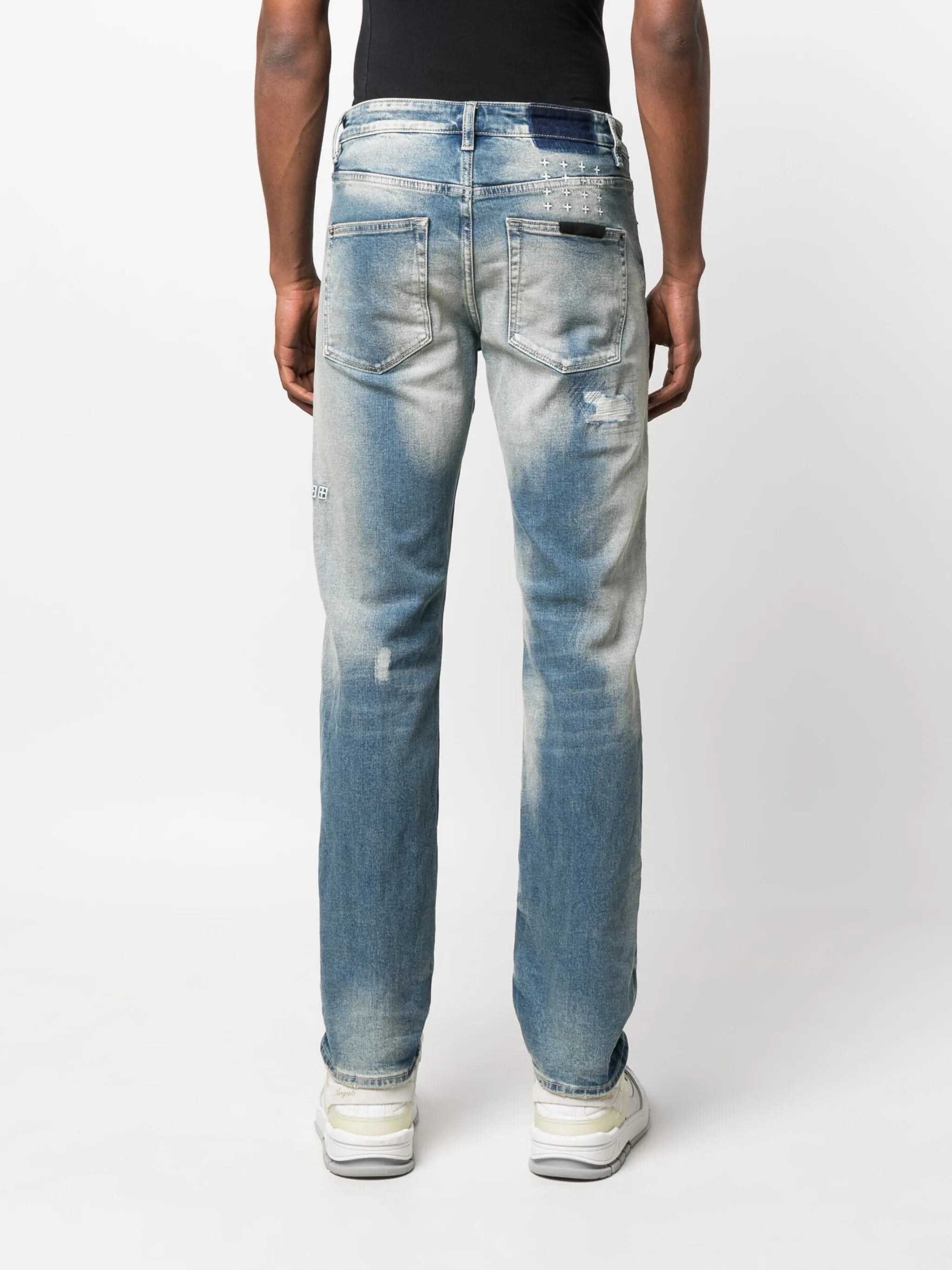 distressed slim-cut jeans