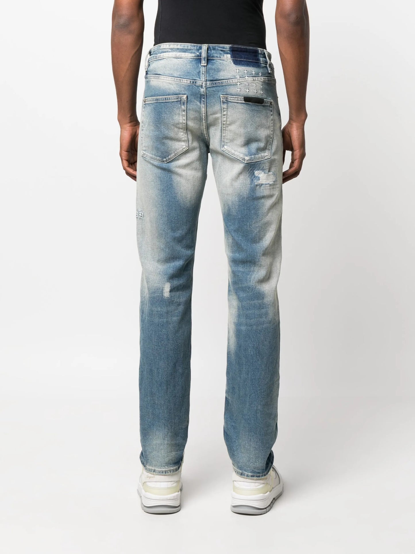 distressed slim-cut jeans