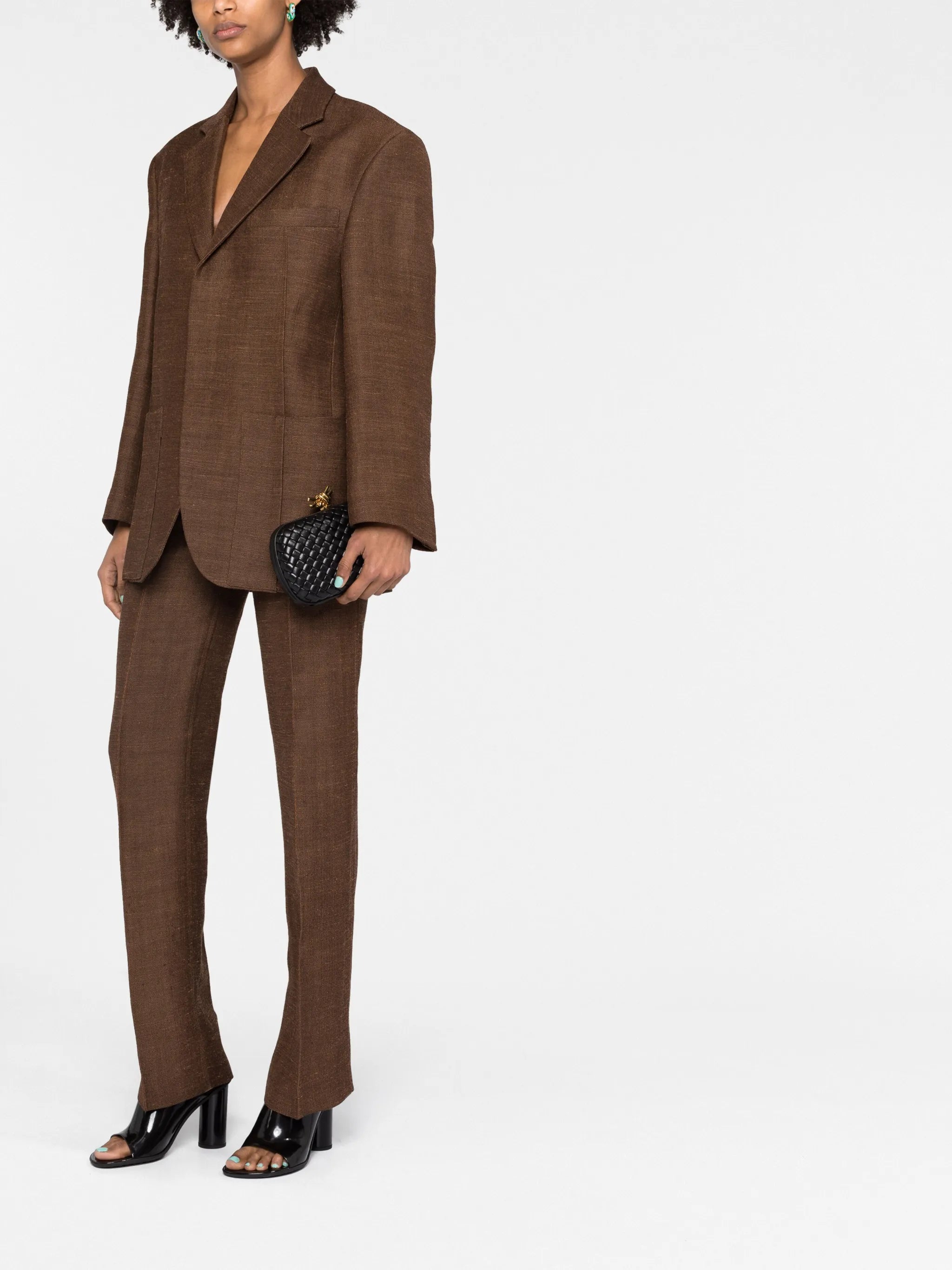 Knot leather clutch bag