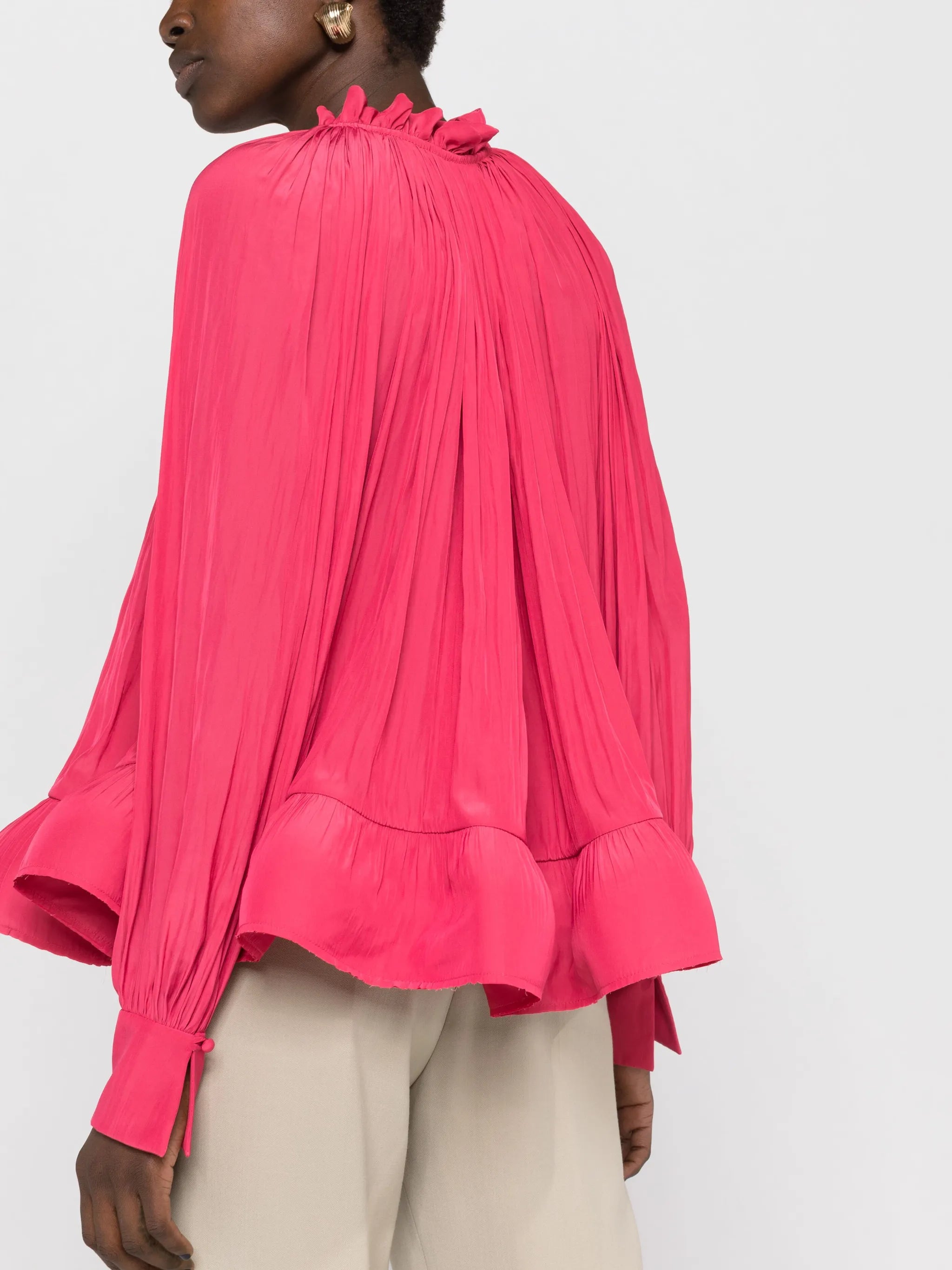 gathered-neck ruffled-hem blouse