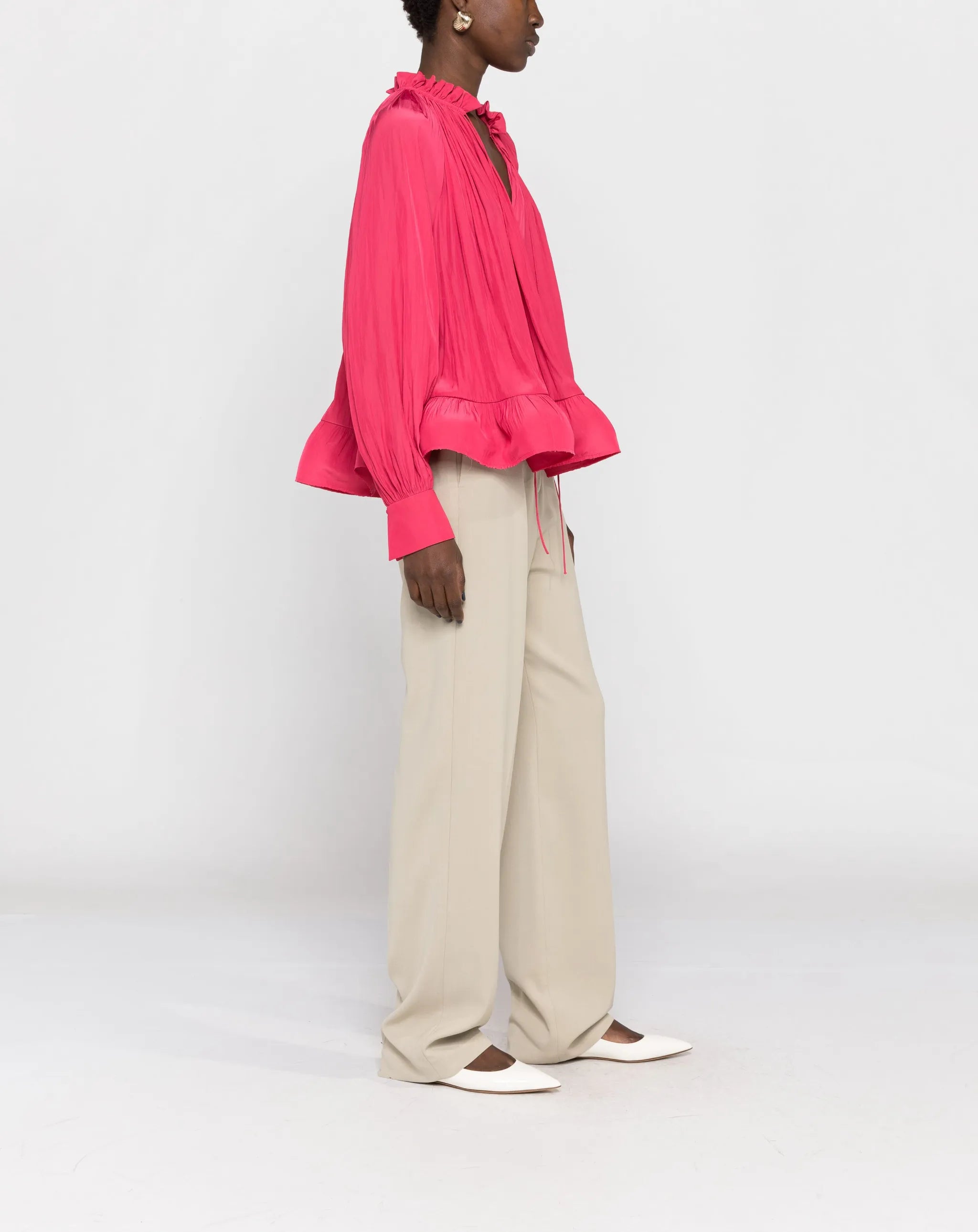 gathered-neck ruffled-hem blouse