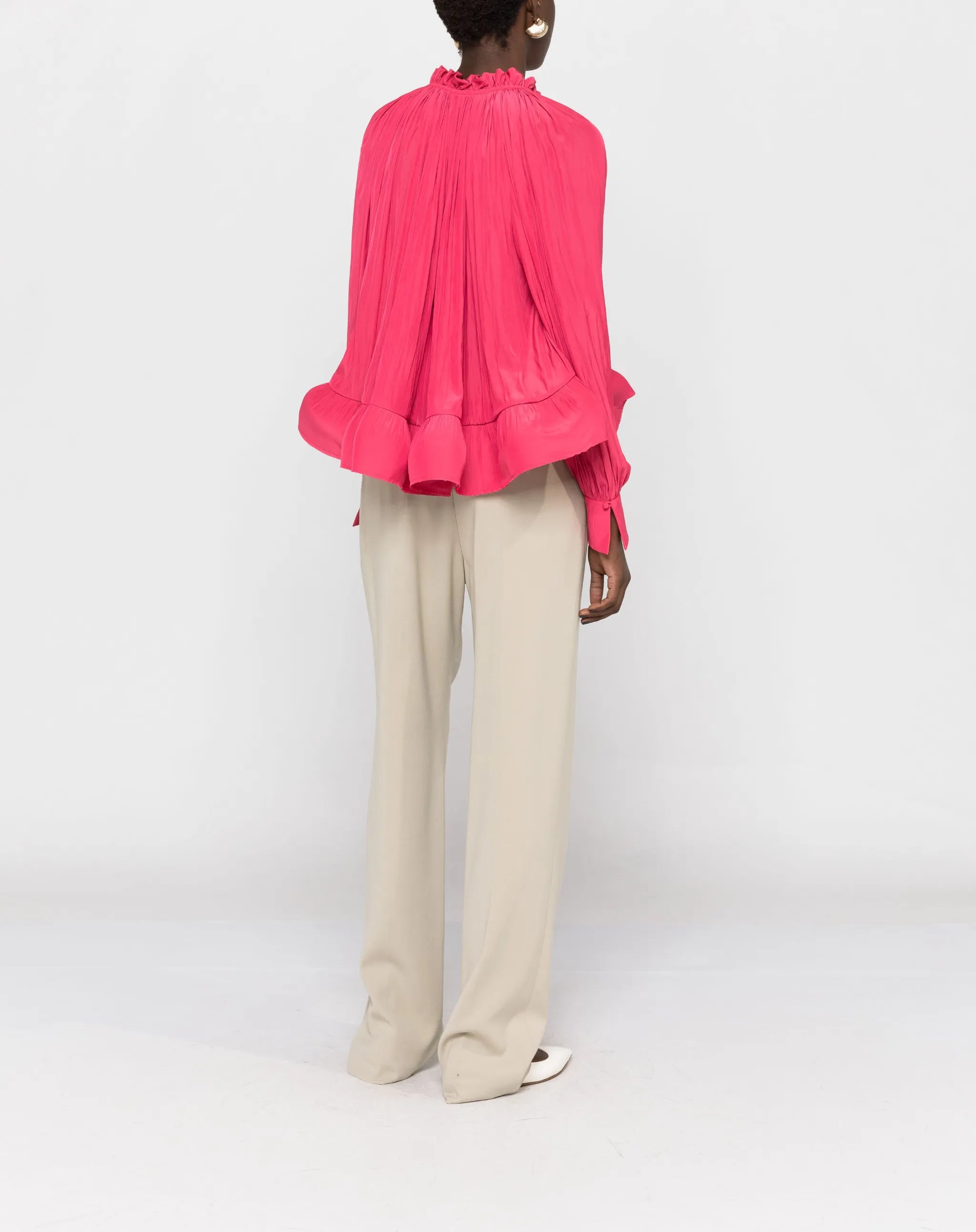 gathered-neck ruffled-hem blouse
