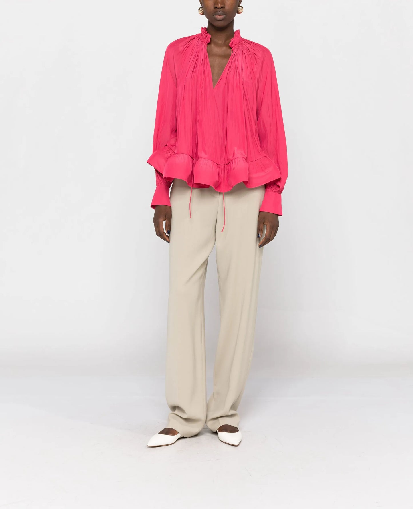 gathered-neck ruffled-hem blouse