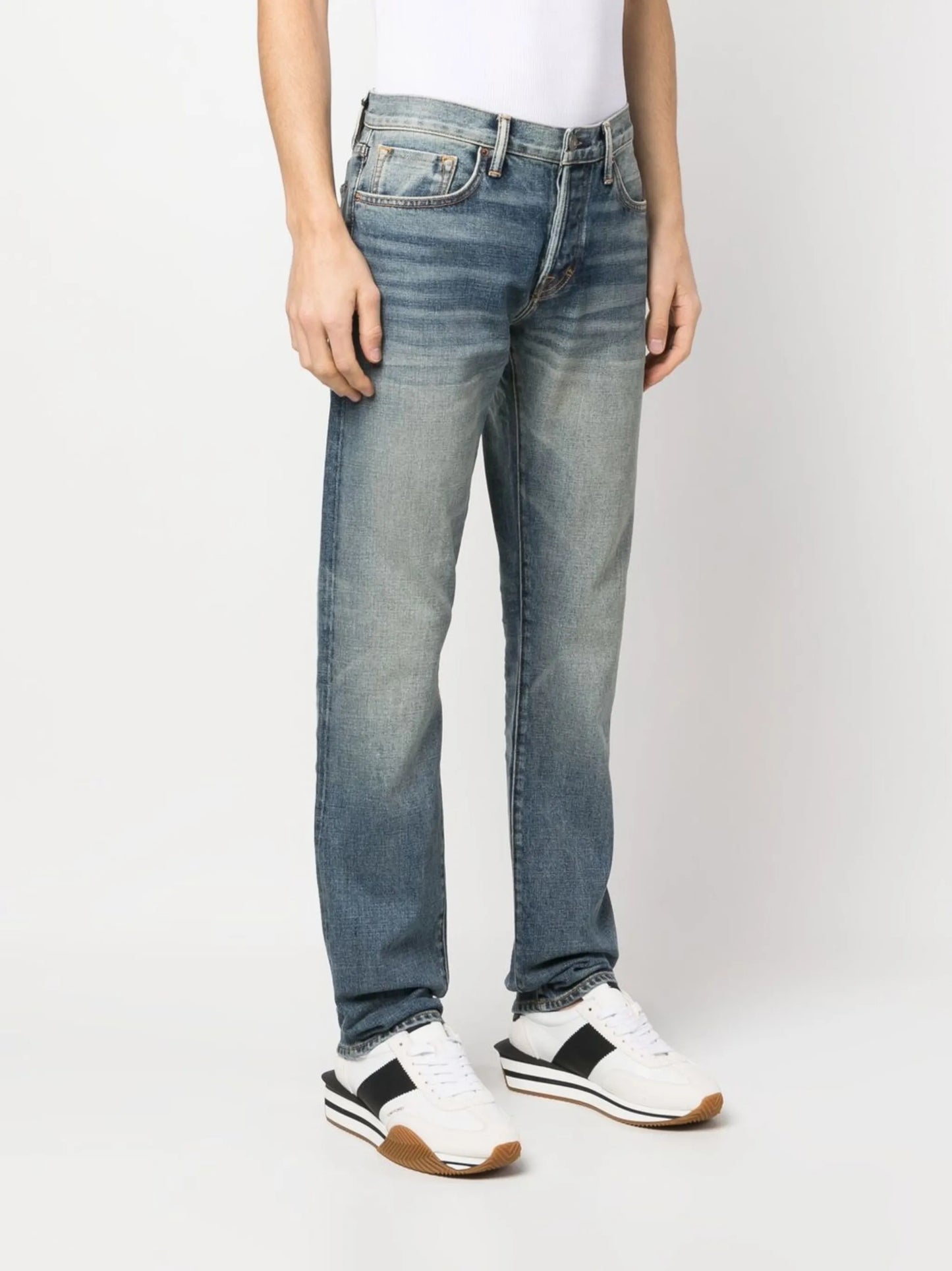 whiskering-effect jeans