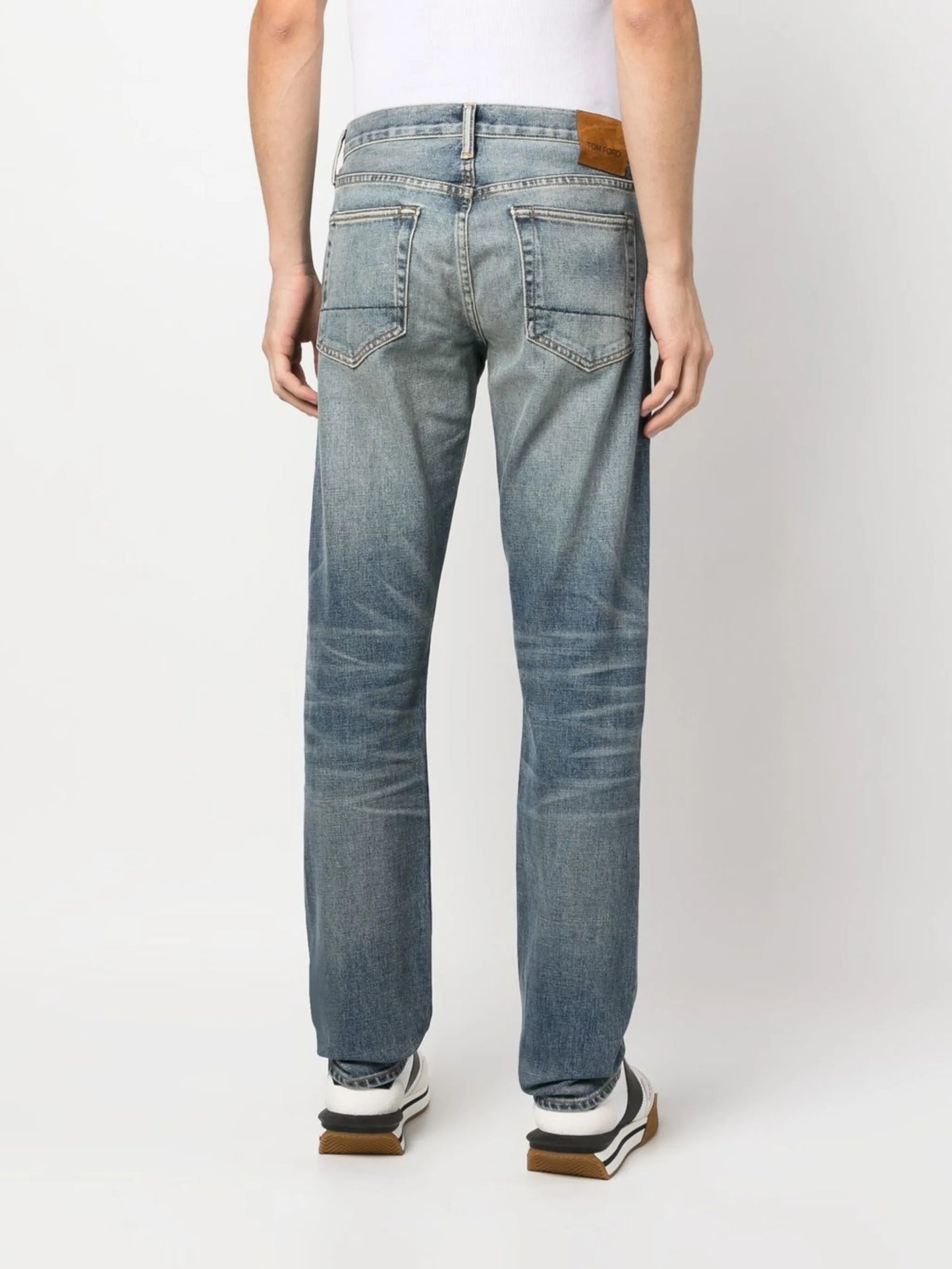 whiskering-effect jeans