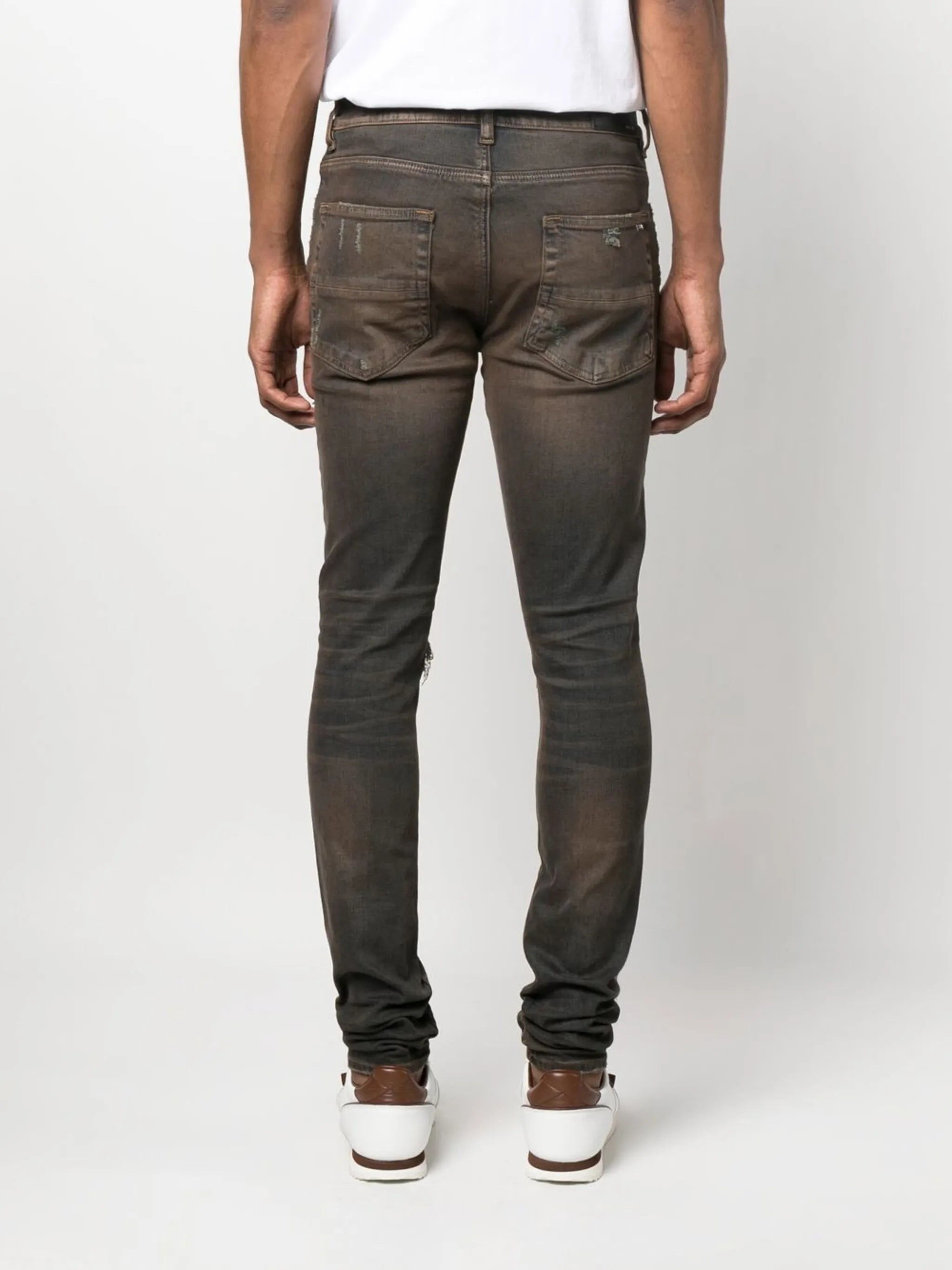 MX1 distressed skinny-cut jeans