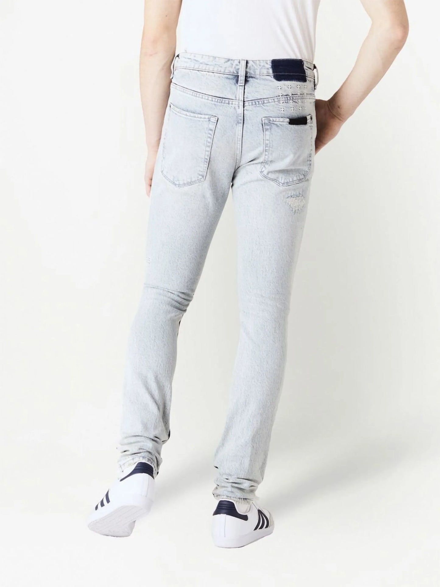 ripped-detail denim trousers
