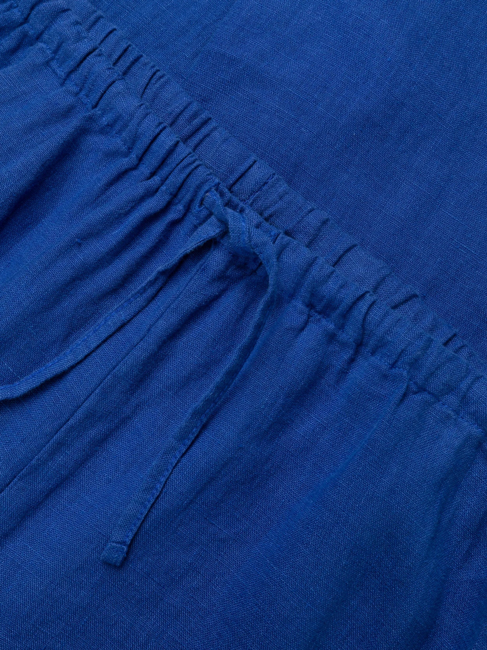 high-waisted linen trousers