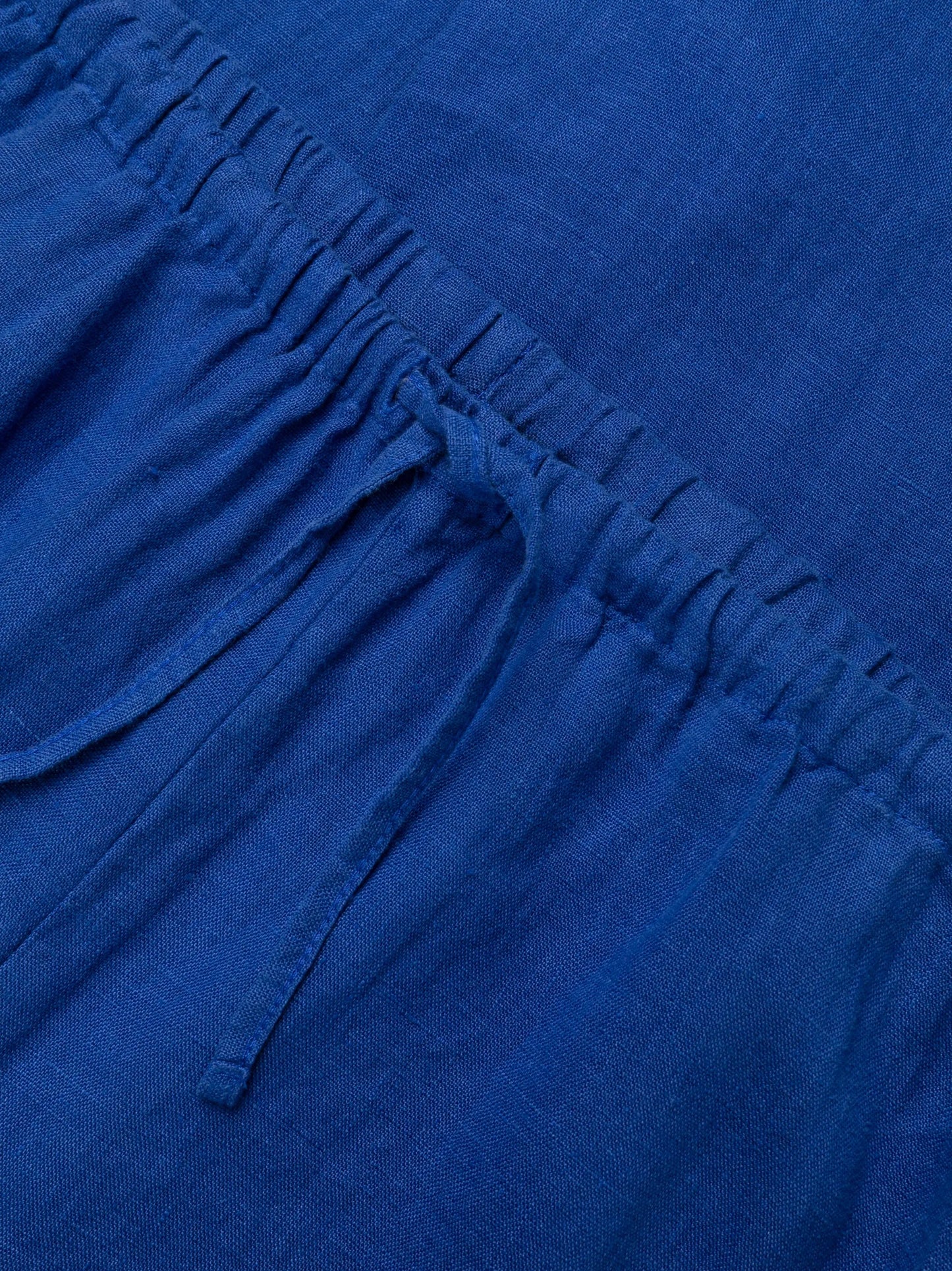 high-waisted linen trousers