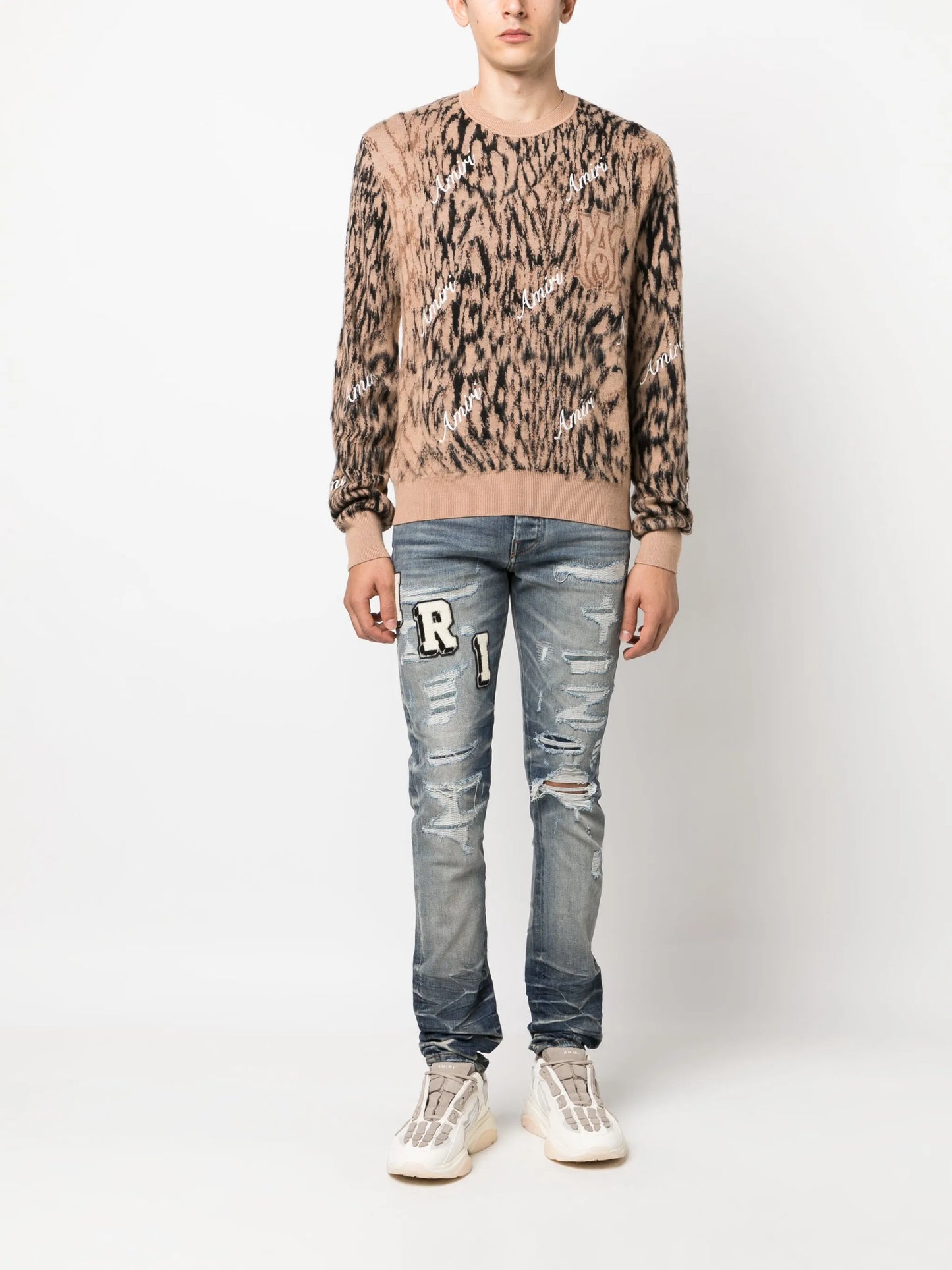 Varsity ripped skinny jeans