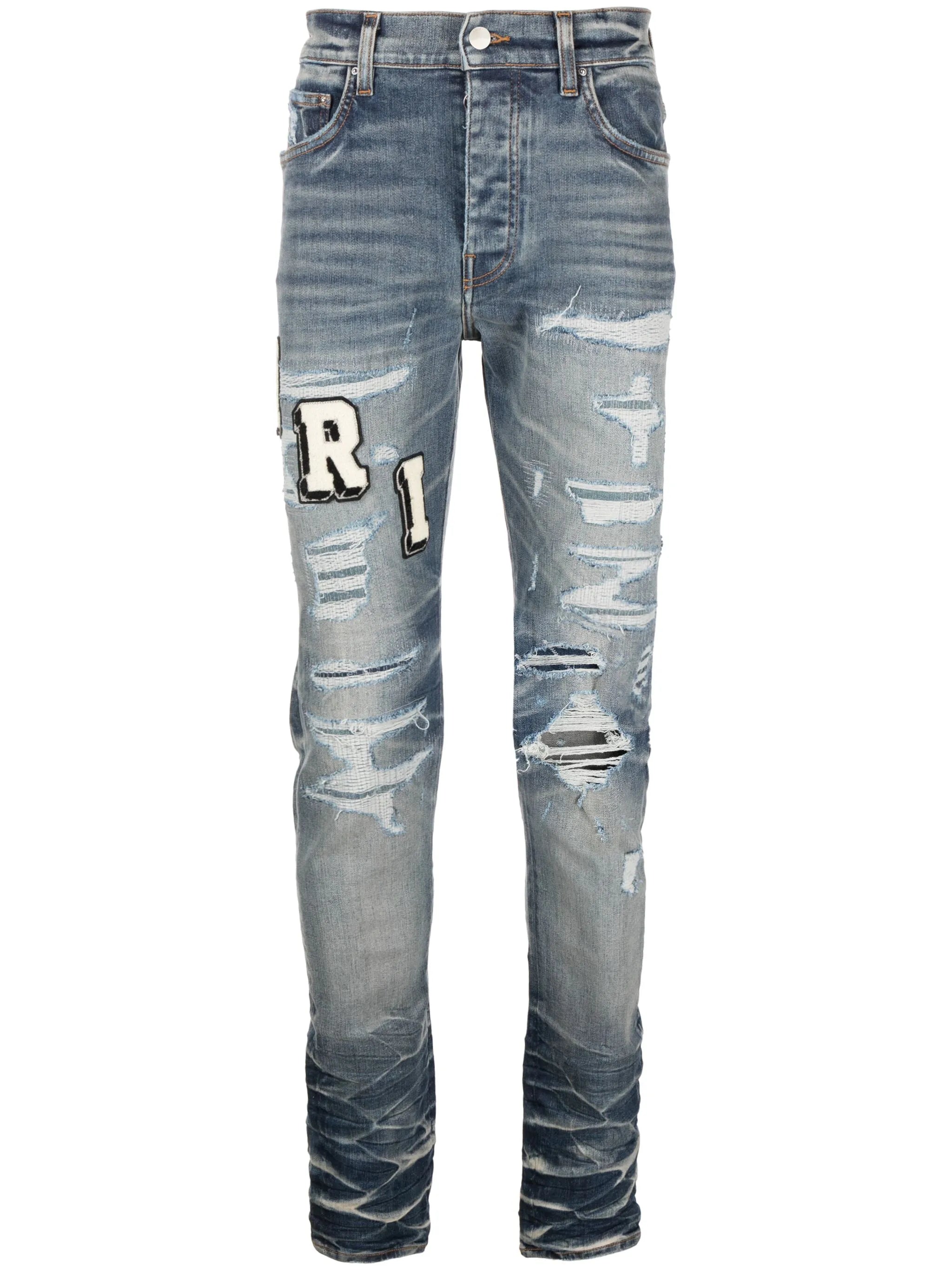 Varsity ripped skinny jeans