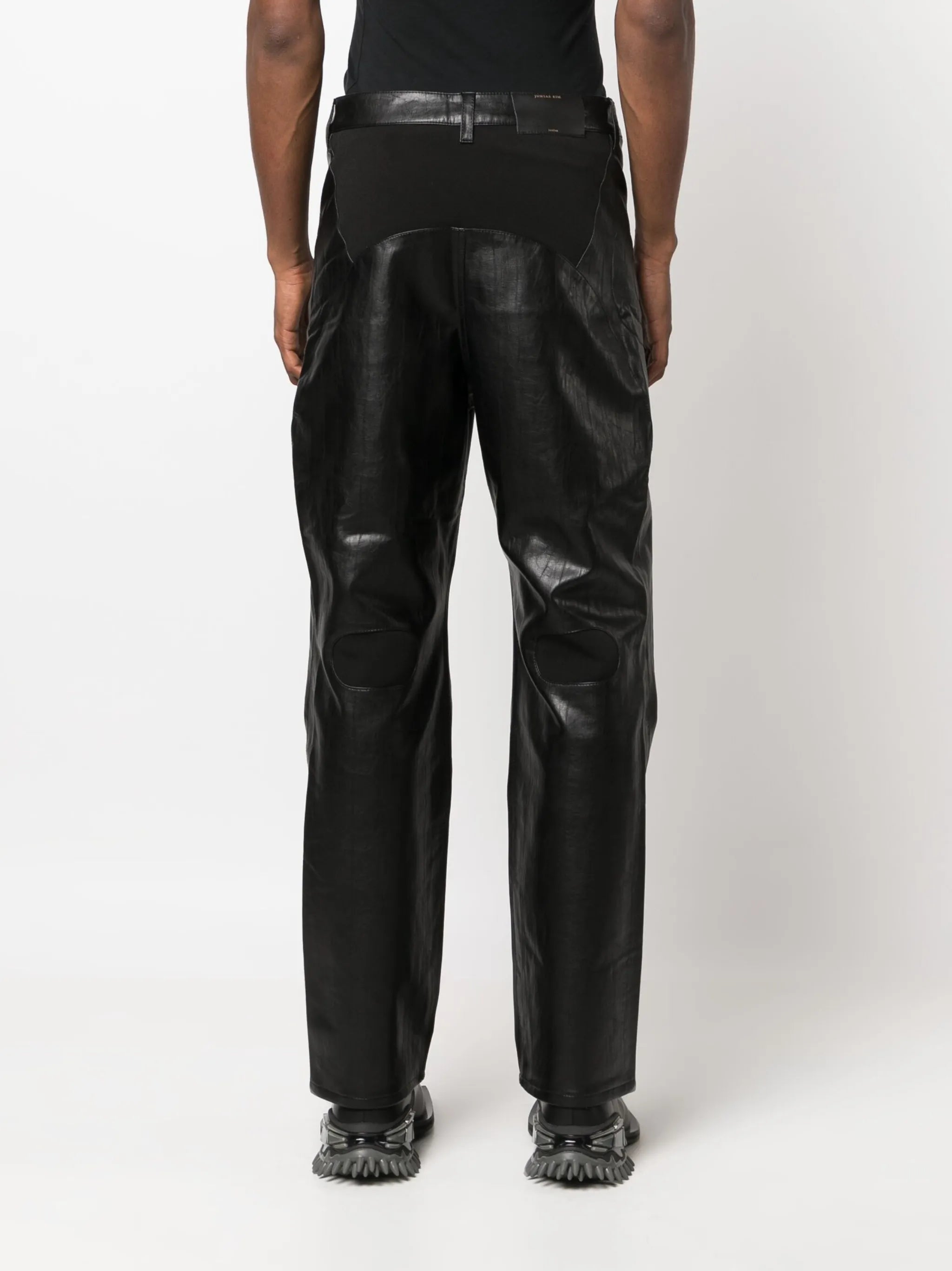 embossed-panel straight-leg trousers