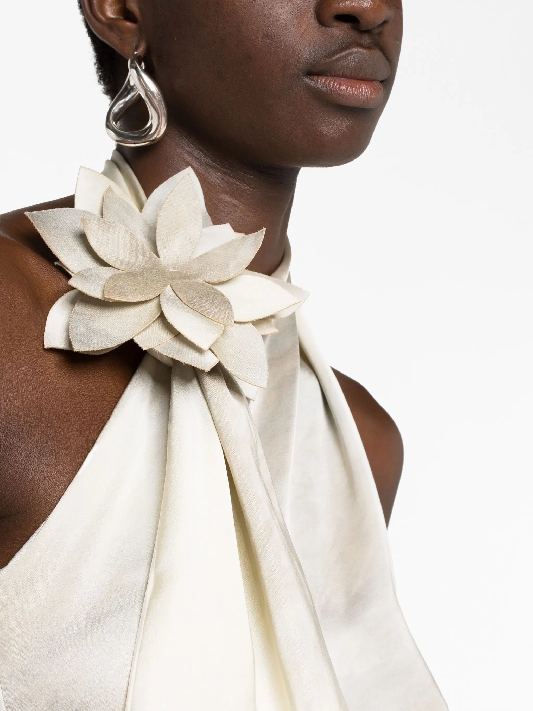 floral-appliqué asymmetric top