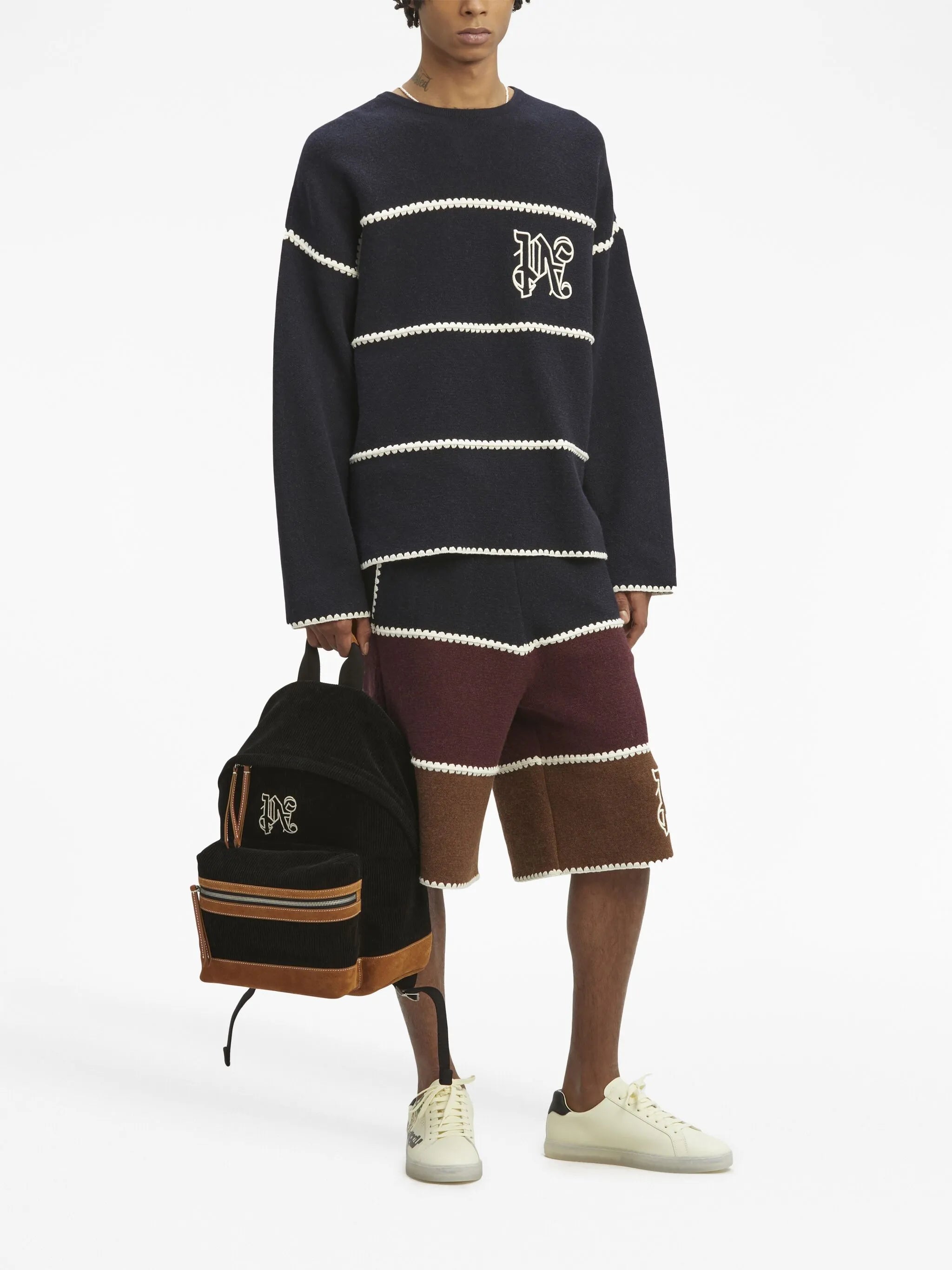 monogram-embroidered leather backpack