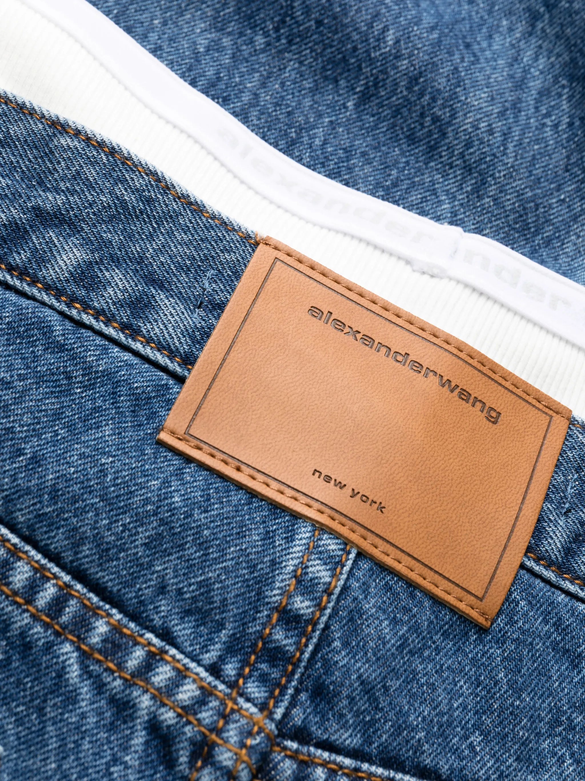 layered straight-leg jeans