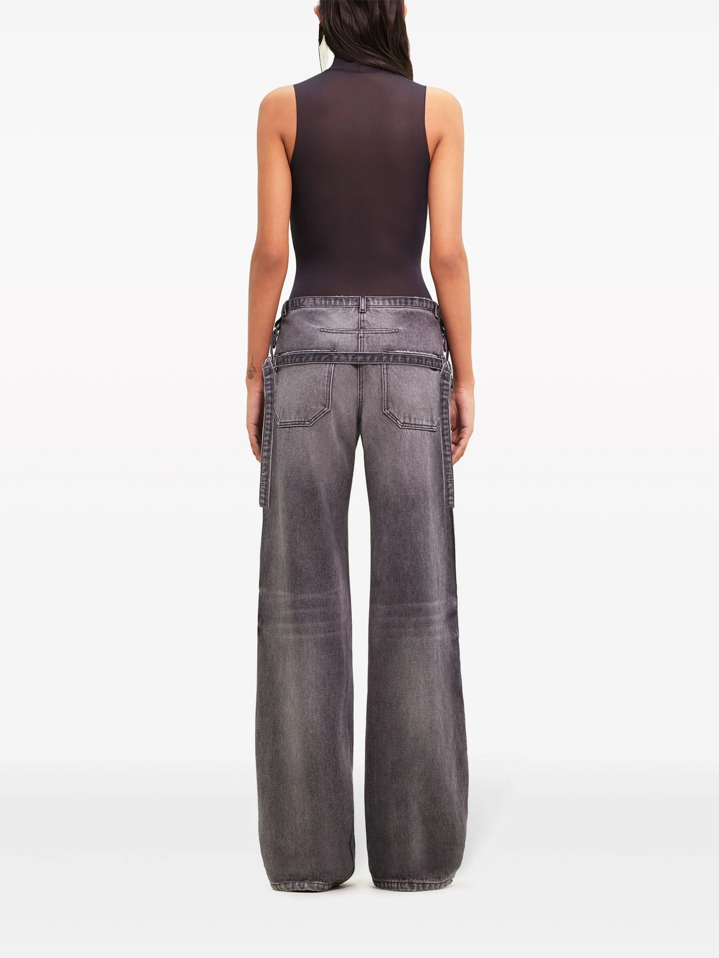 One Strap stonewashed mid-rise jeans