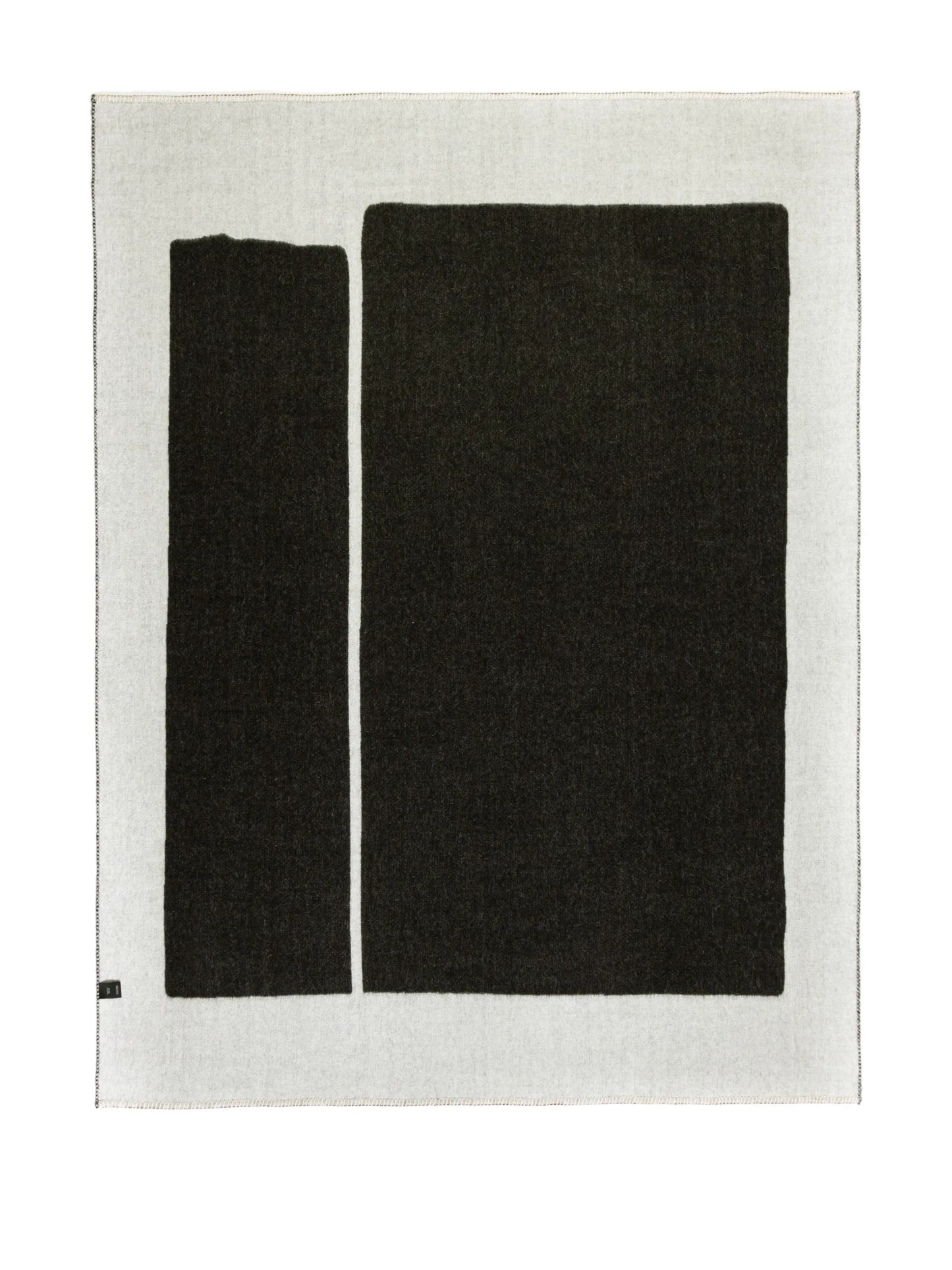 Generation reversible alpaca-wool throw