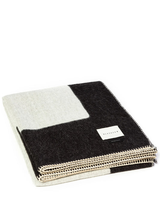 Generation reversible alpaca-wool throw