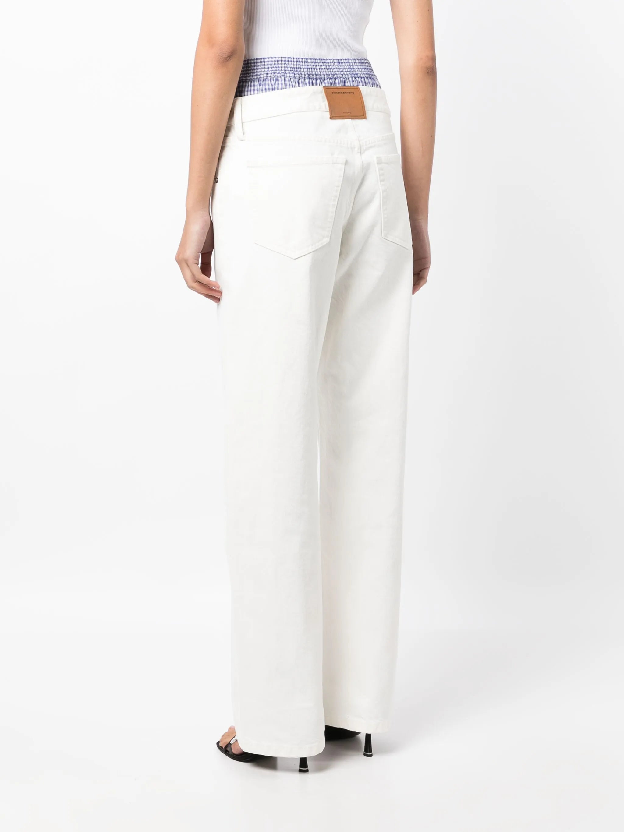 layered straight-leg jeans