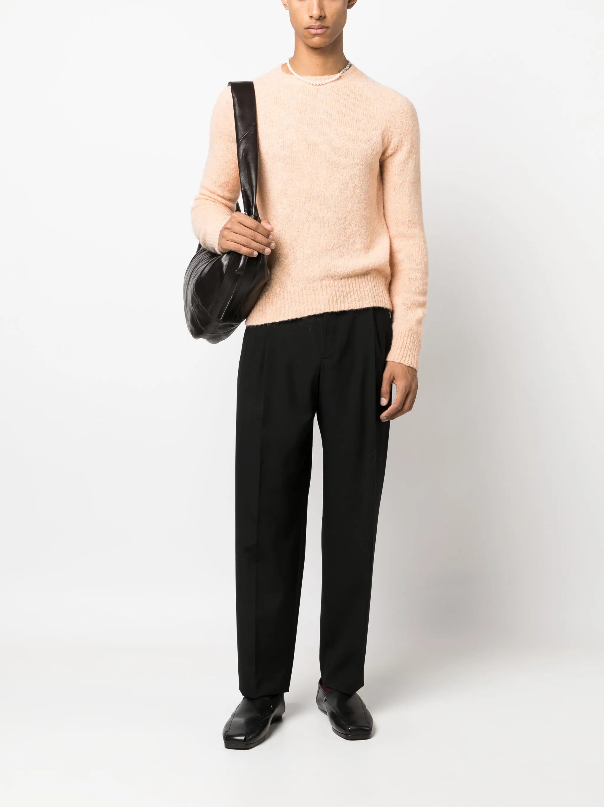 pleated tapered wool trousers