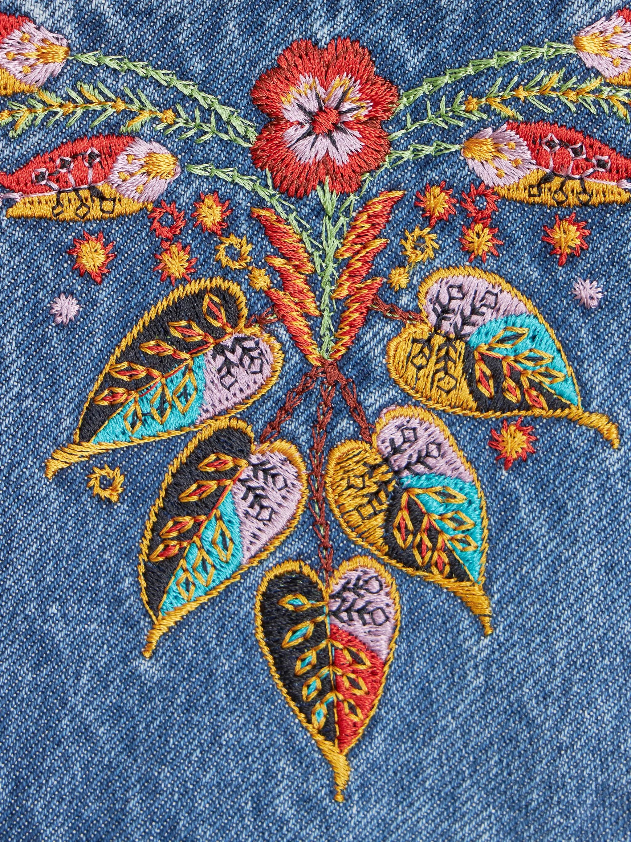 floral-embroidered flared jeans