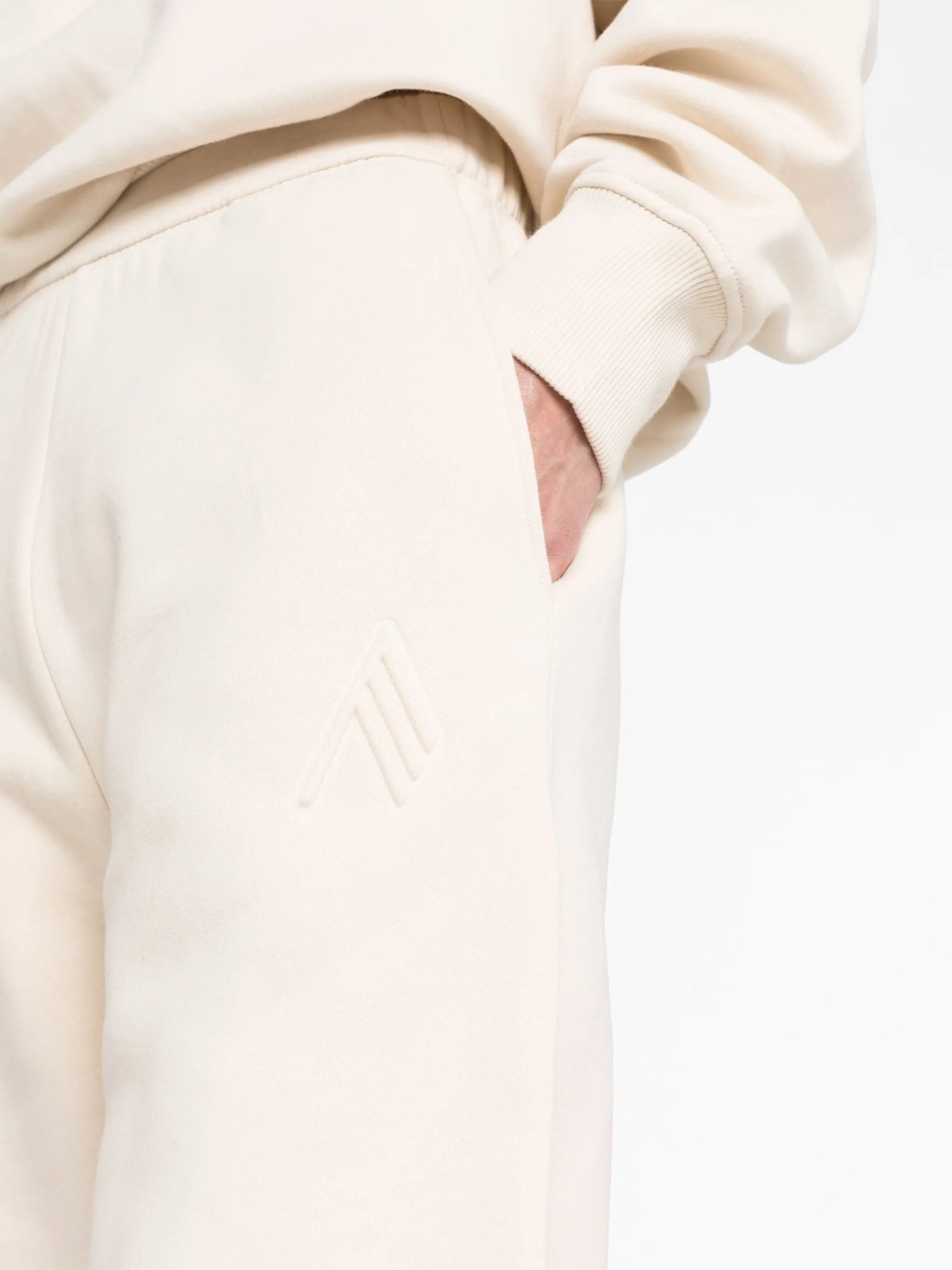 Penny logo-embossed cotton track pants