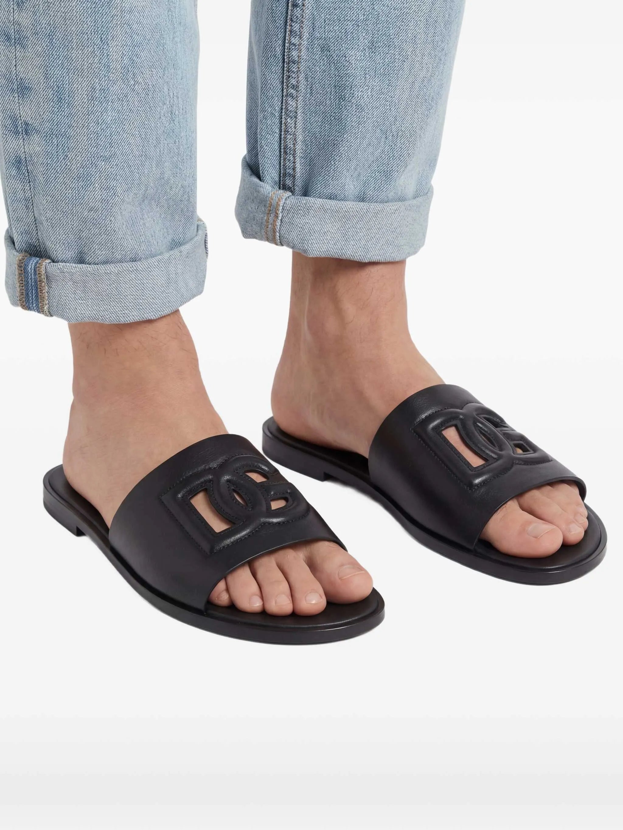 embossed-logo leather slides