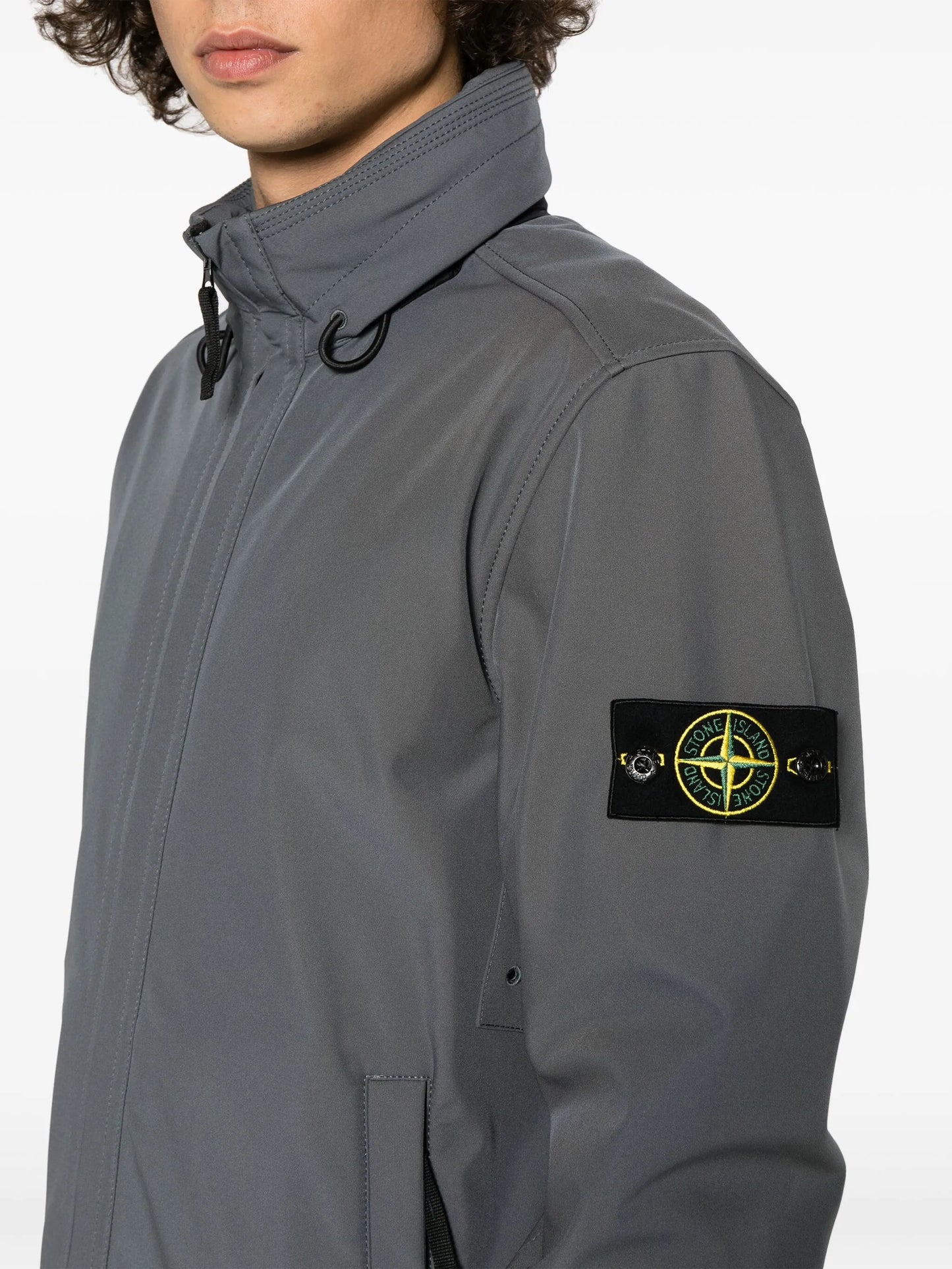 Compass-badge funnel-neck jacket