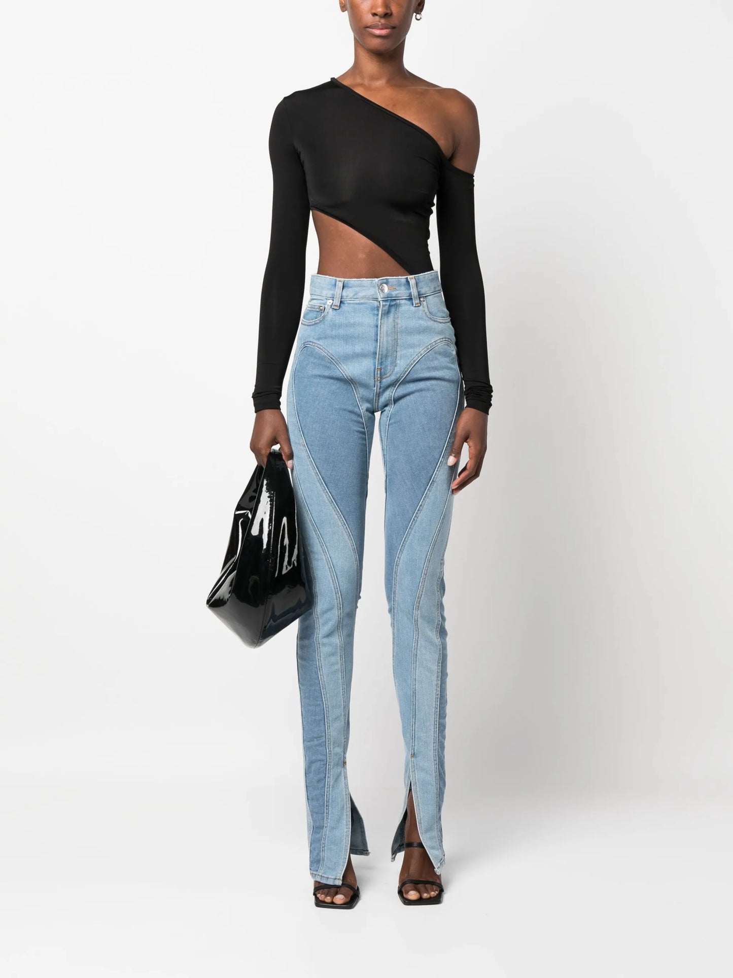 Spiral split-hem skinny jeans
