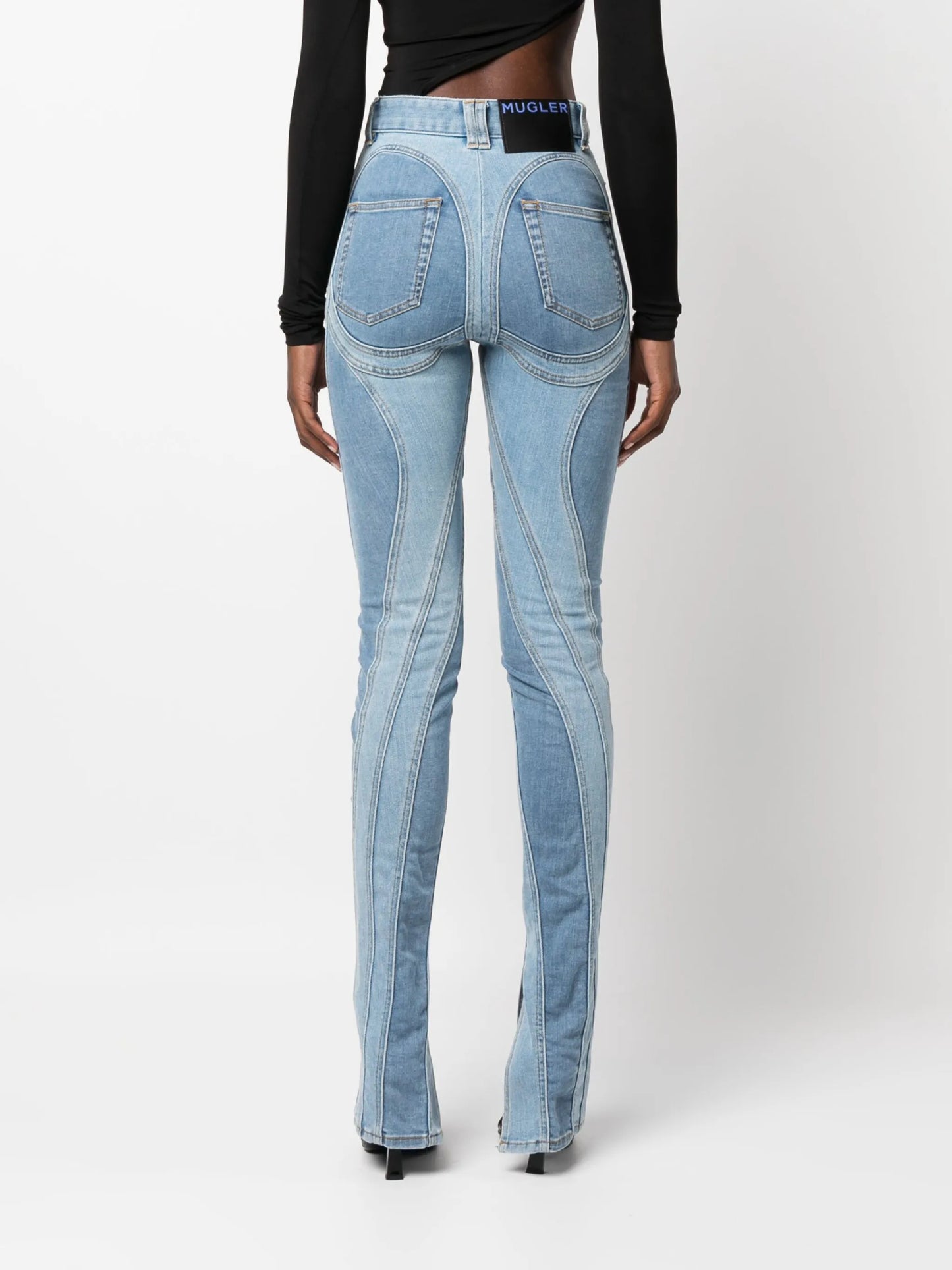 Spiral split-hem skinny jeans