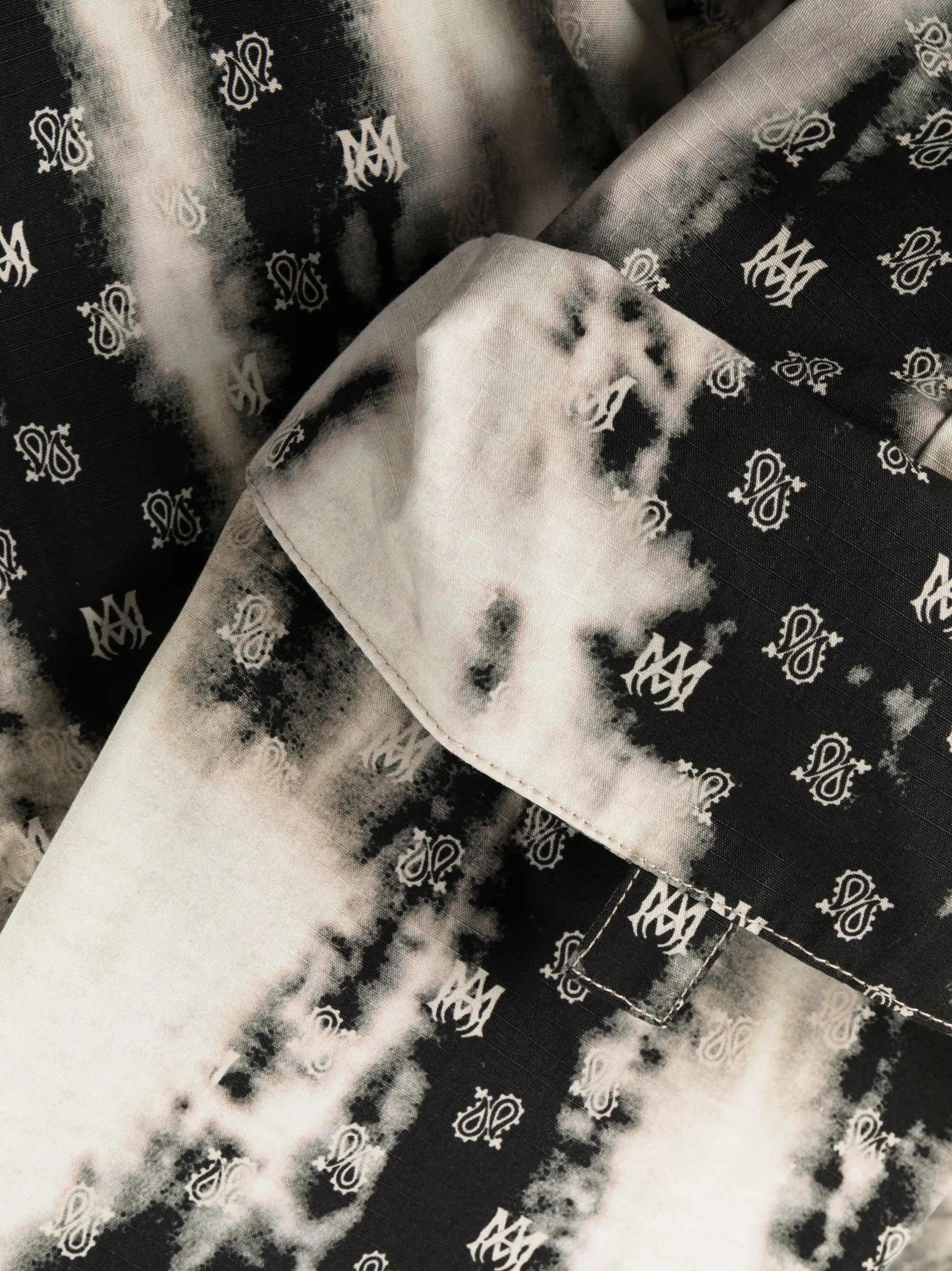 monogram-pattern cotton cargo trousers