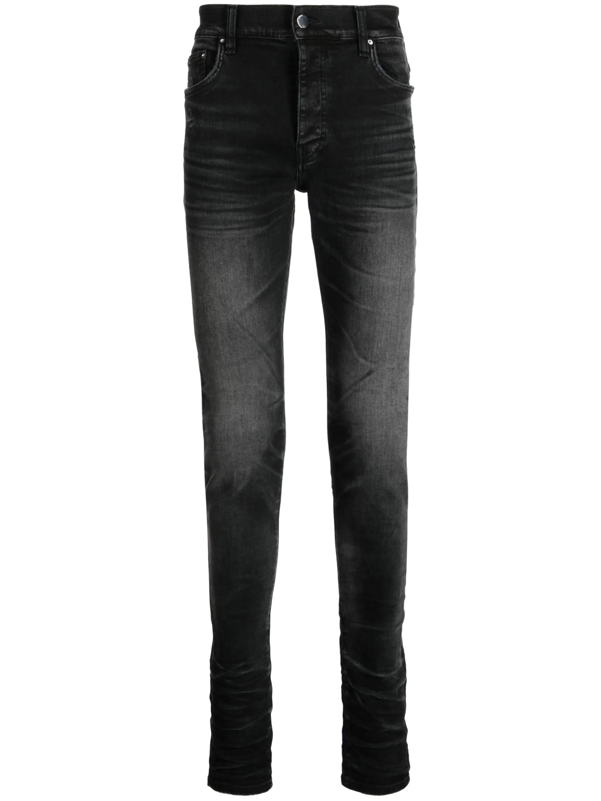 Stack whiskered skinny jeans
