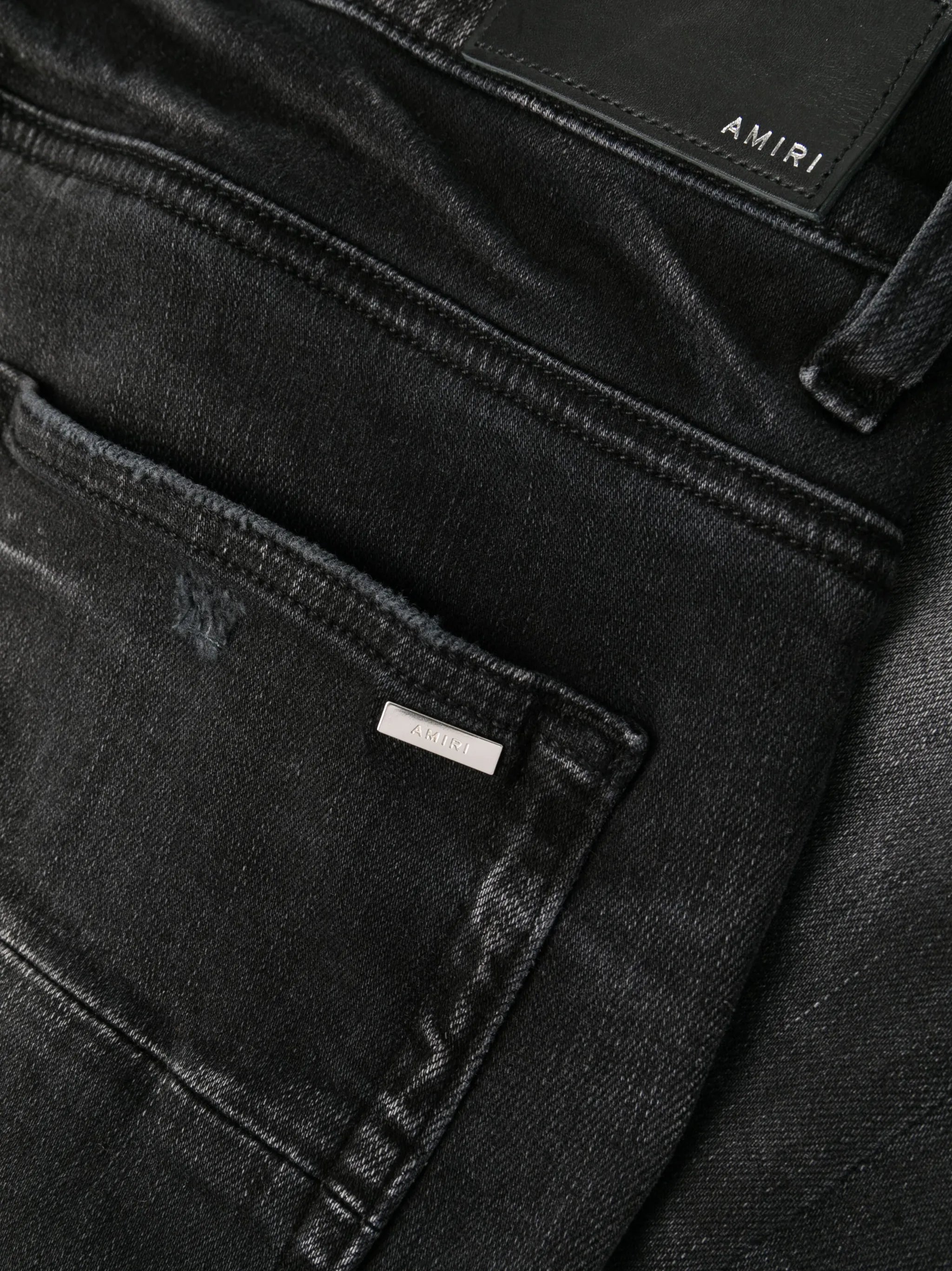 Stack whiskered skinny jeans